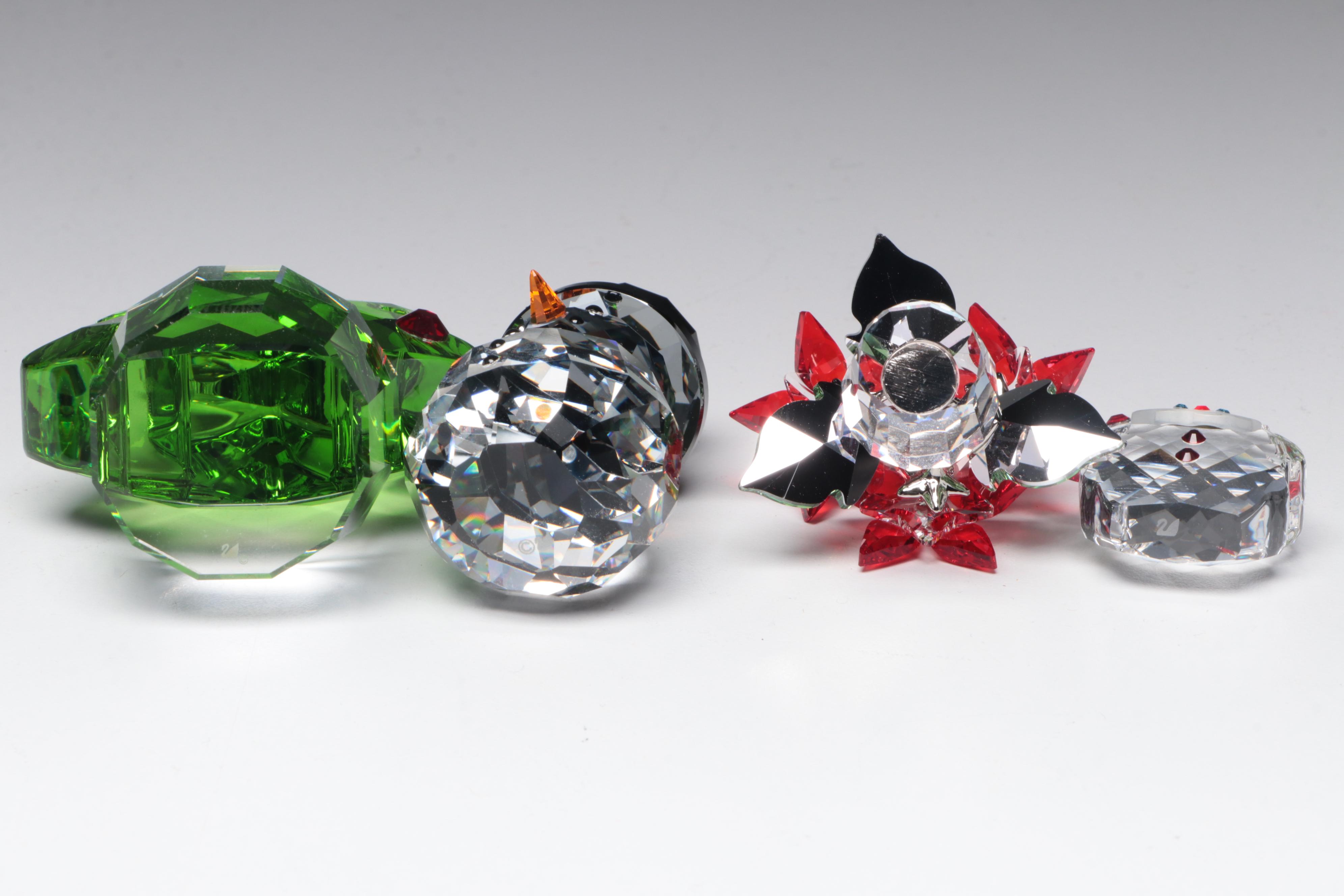 Swarovski Crystal Ornaments Featuring a Poinsettia and Christmas Tree