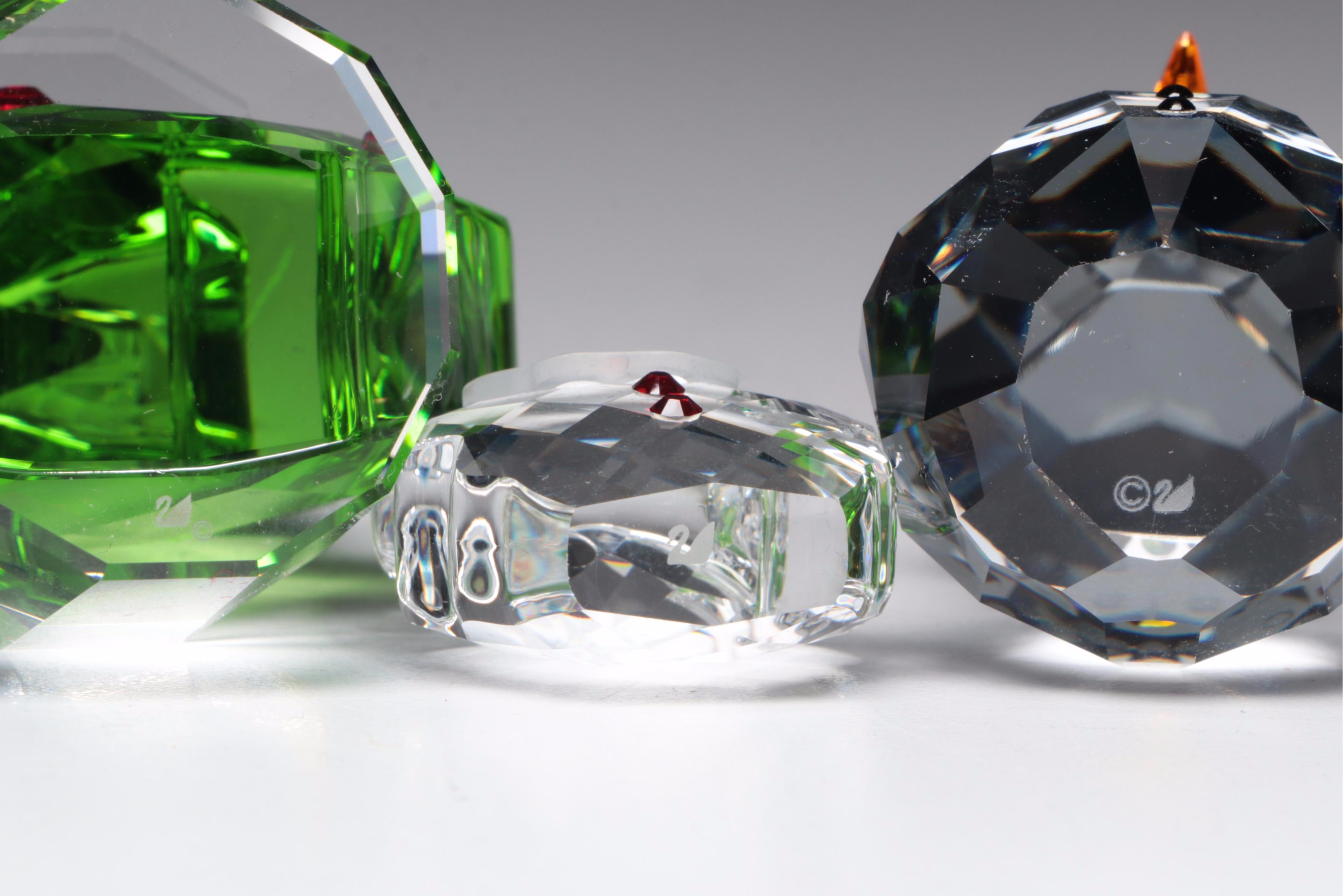 Swarovski Crystal Ornaments Featuring a Poinsettia and Christmas Tree