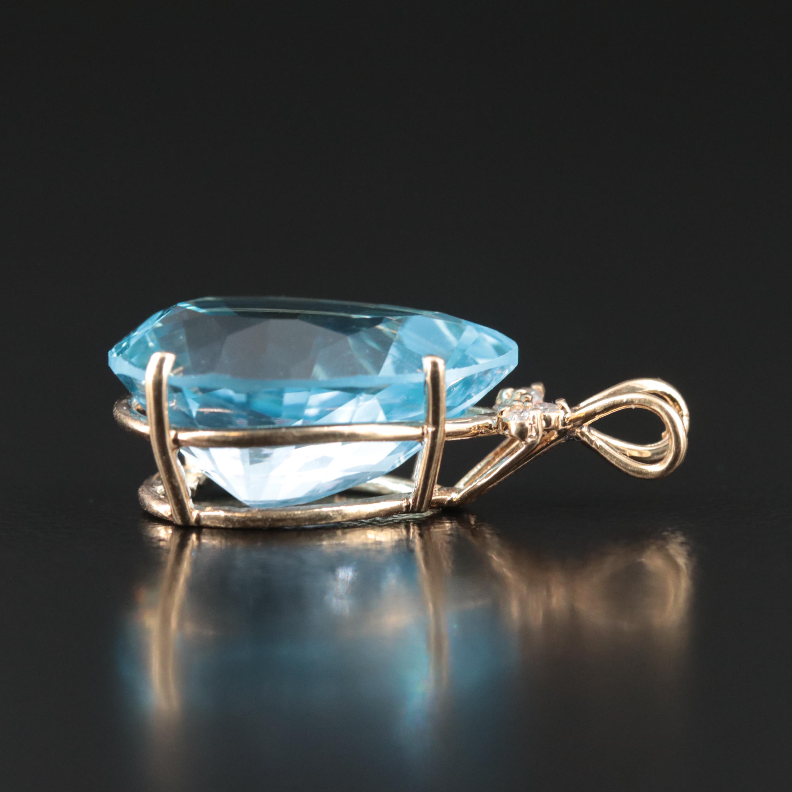 14K 23.30 CT Sky Blue Topaz and Diamond Pendant