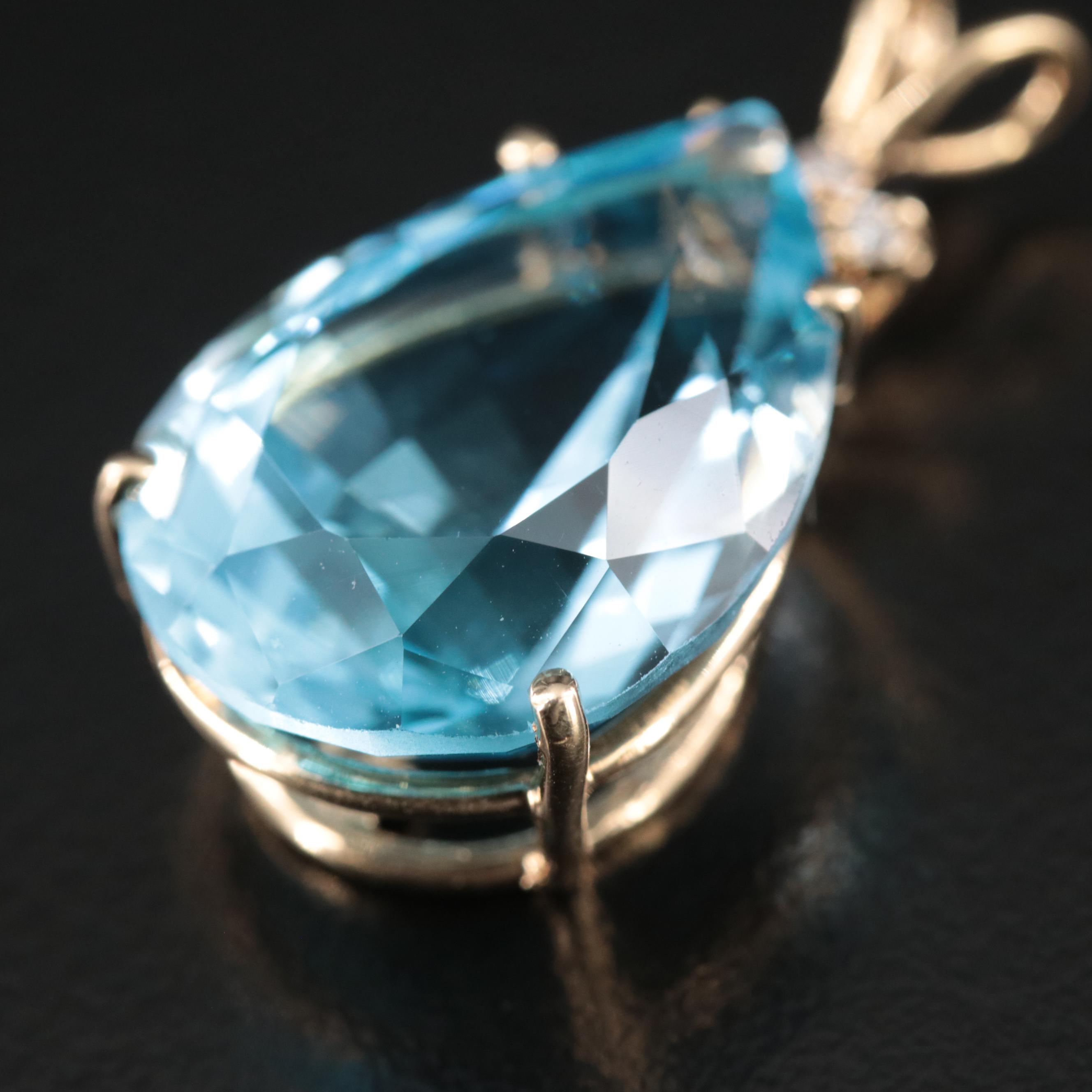 14K 23.30 CT Sky Blue Topaz and Diamond Pendant