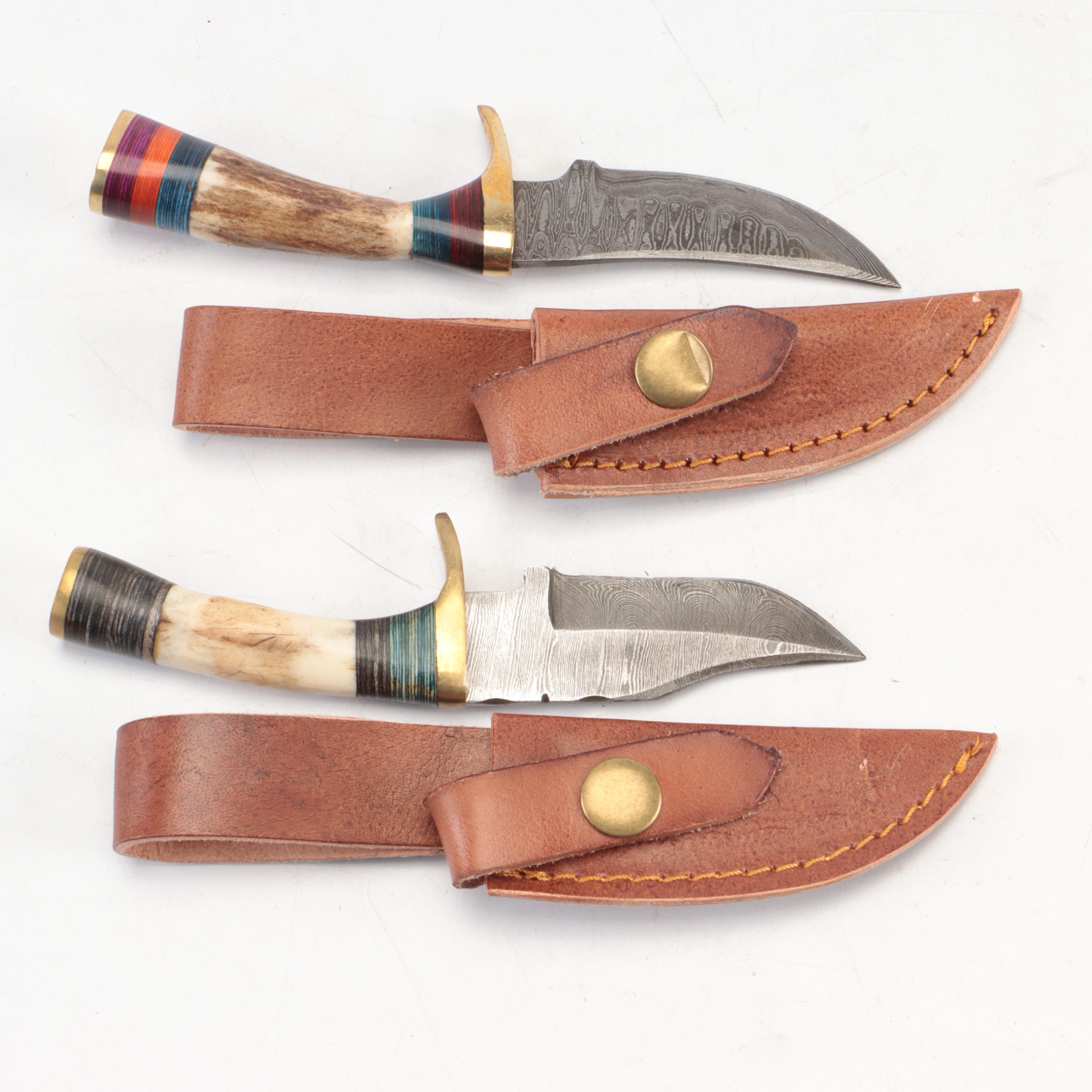 Seven Antler-Handled Damascus Steel Blade Knives with Leather Sheaths