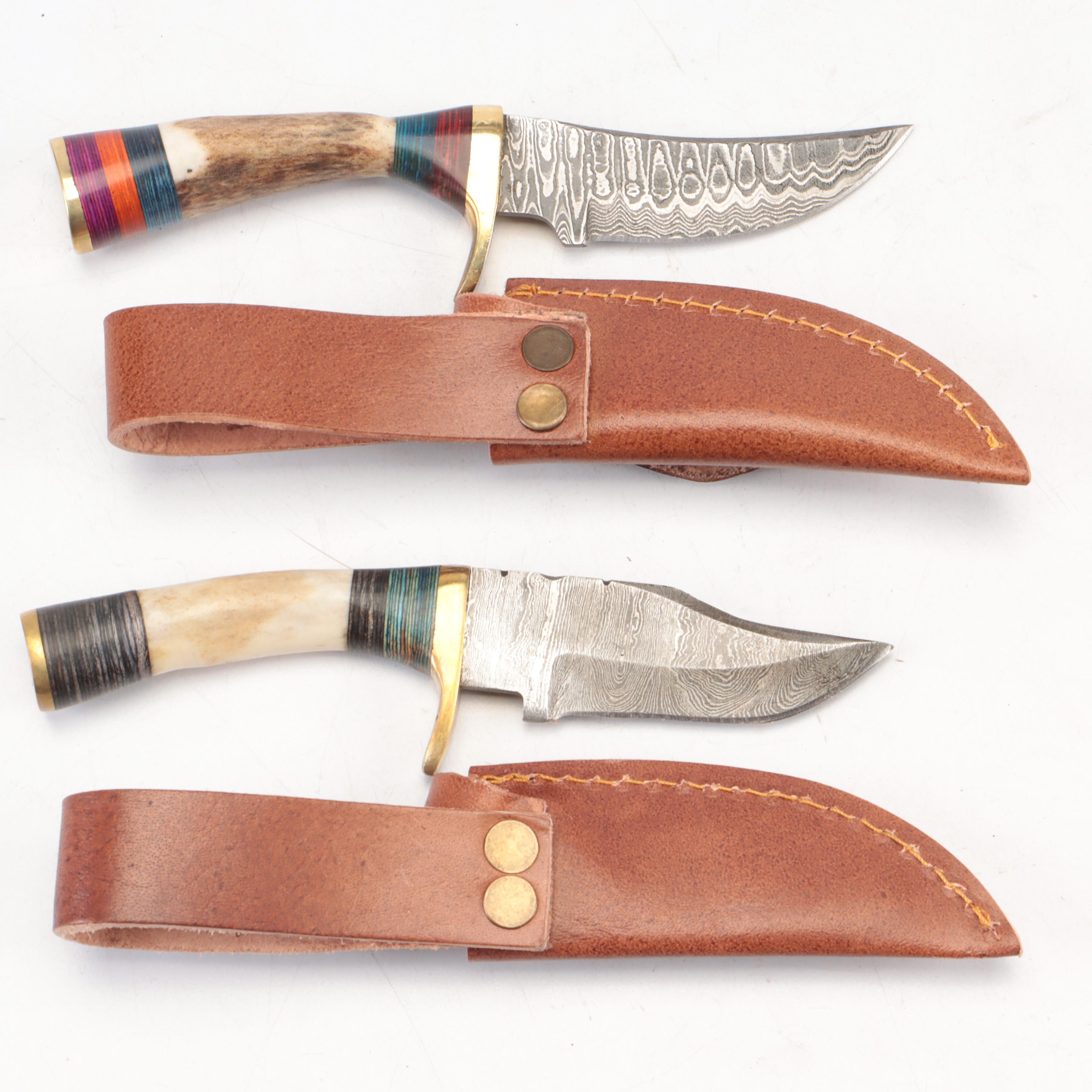 Seven Antler-Handled Damascus Steel Blade Knives with Leather Sheaths