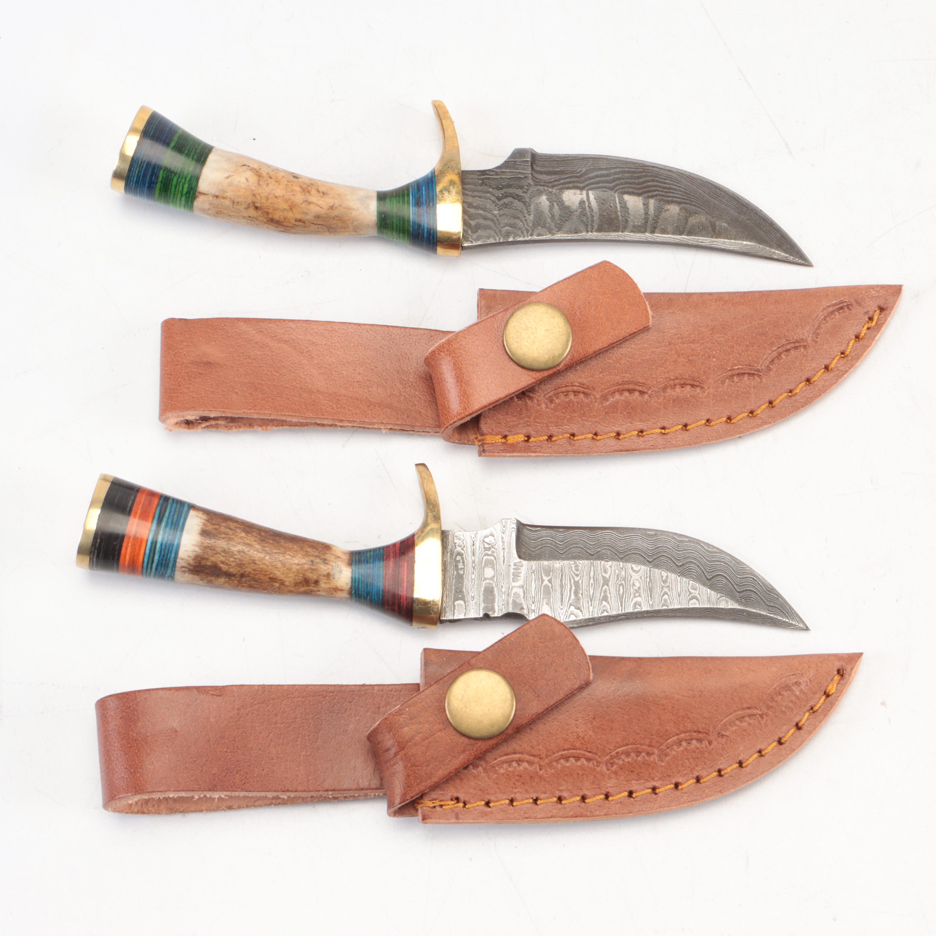 Seven Antler-Handled Damascus Steel Blade Knives with Leather Sheaths
