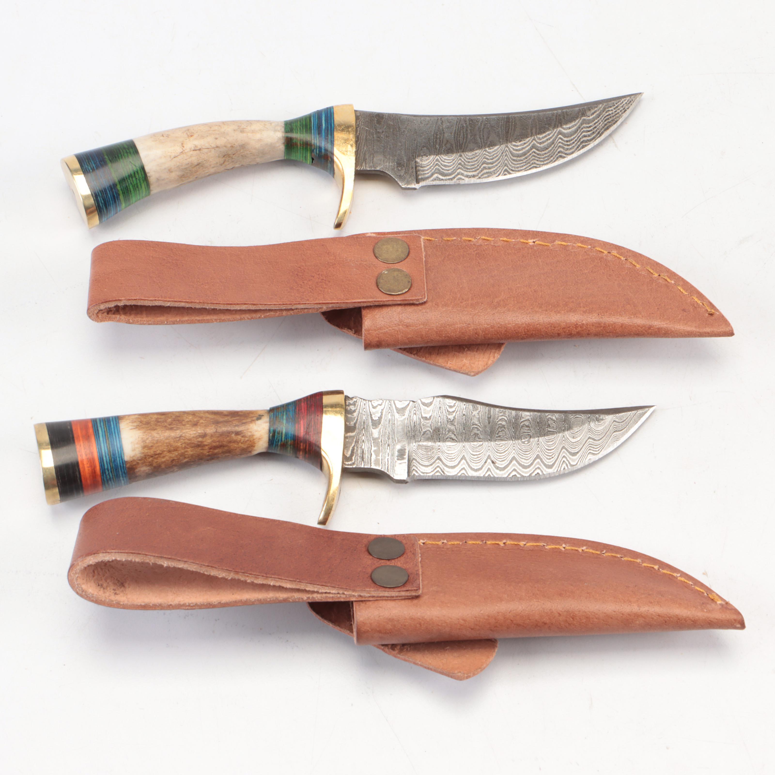 Seven Antler-Handled Damascus Steel Blade Knives with Leather Sheaths