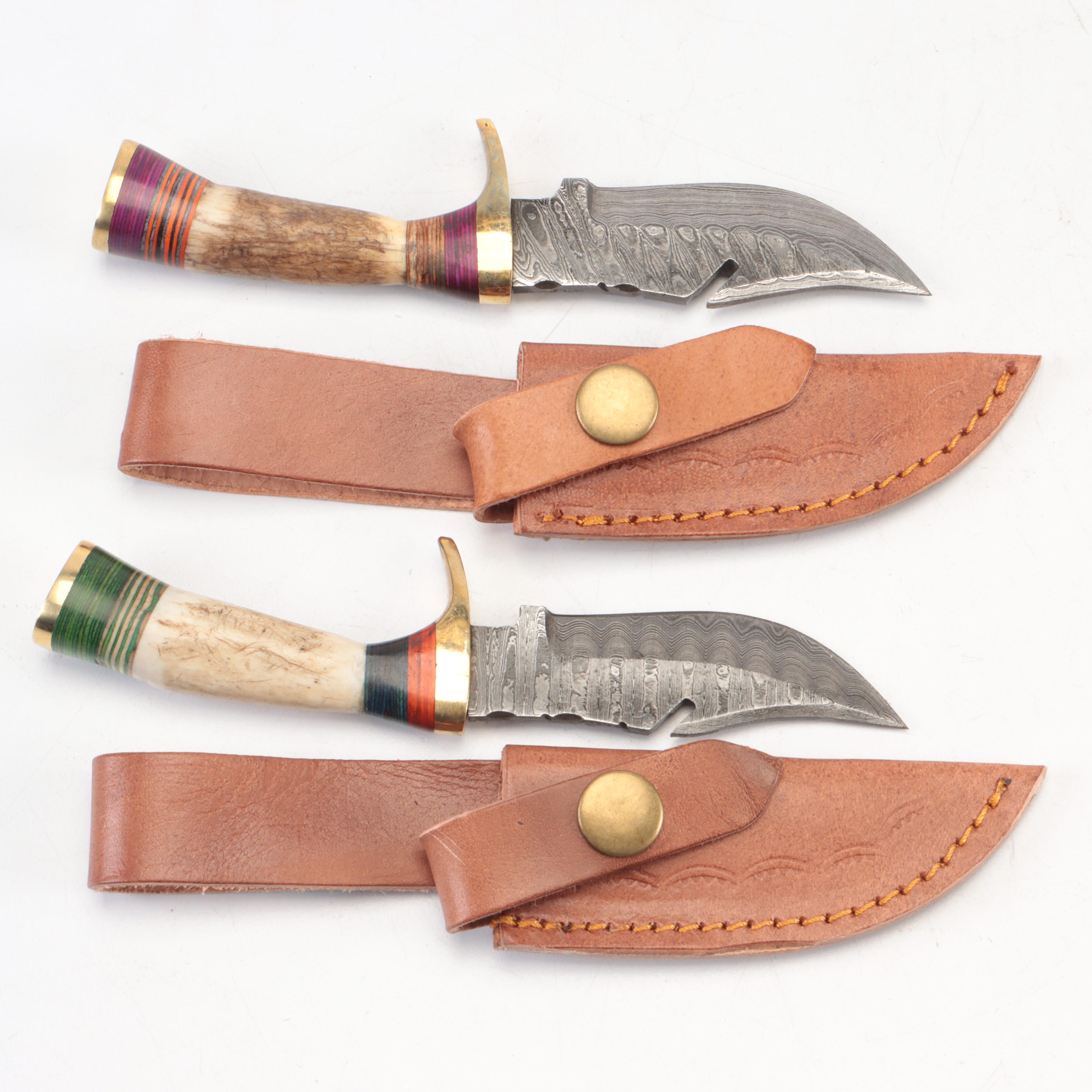 Seven Antler-Handled Damascus Steel Blade Knives with Leather Sheaths