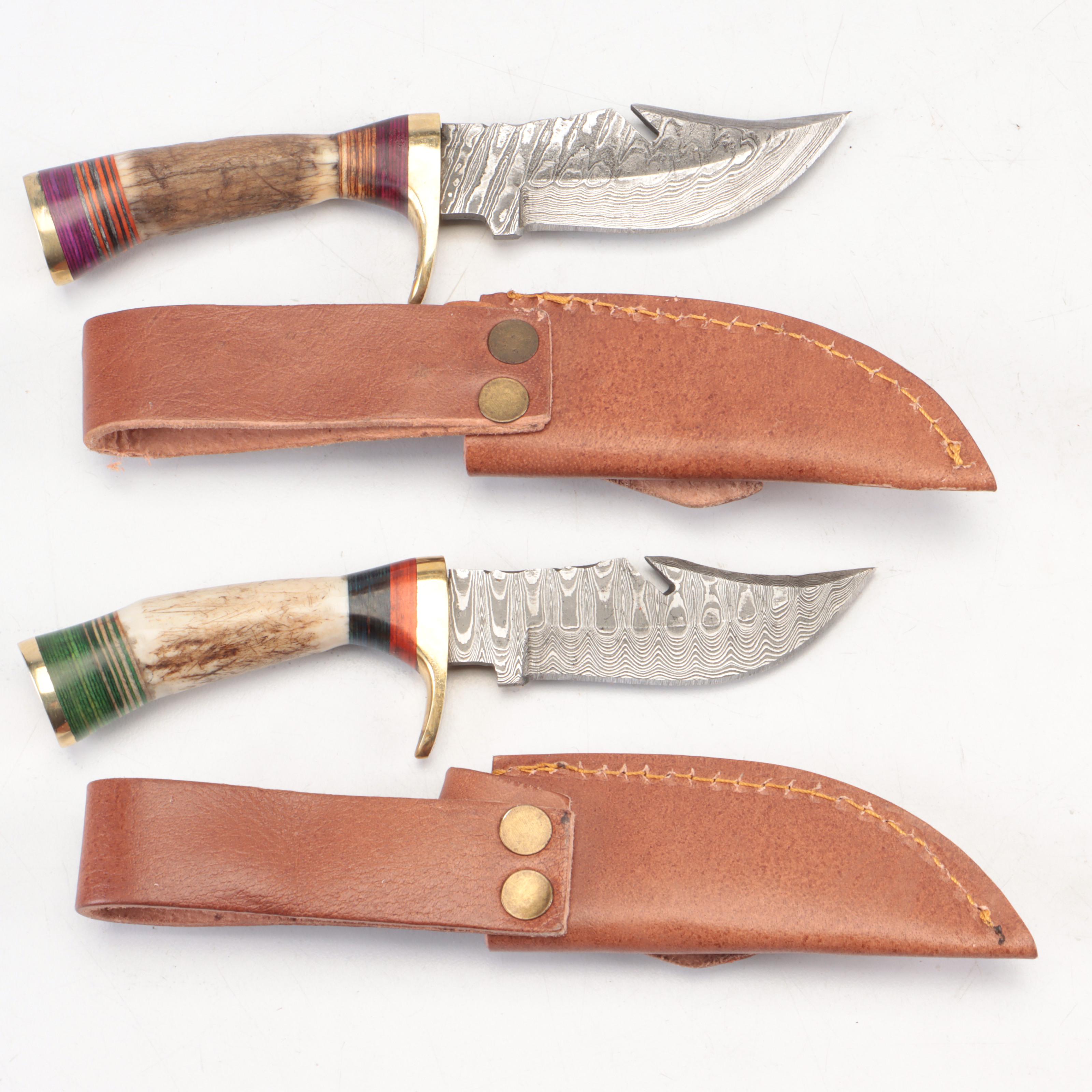 Seven Antler-Handled Damascus Steel Blade Knives with Leather Sheaths