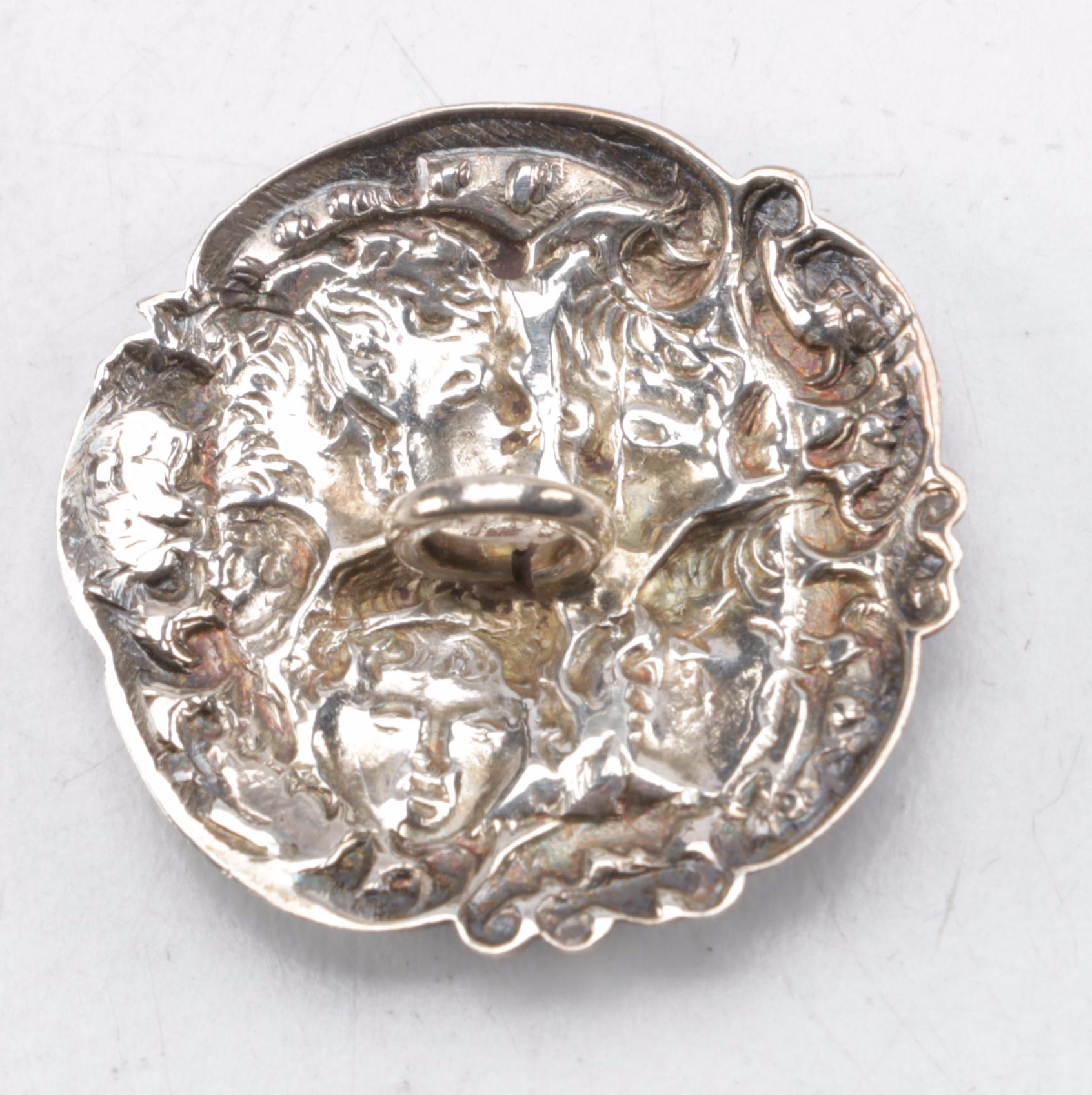 Levi & Salaman Sterling Silver Repoussé Cherubic Buttons, 1901