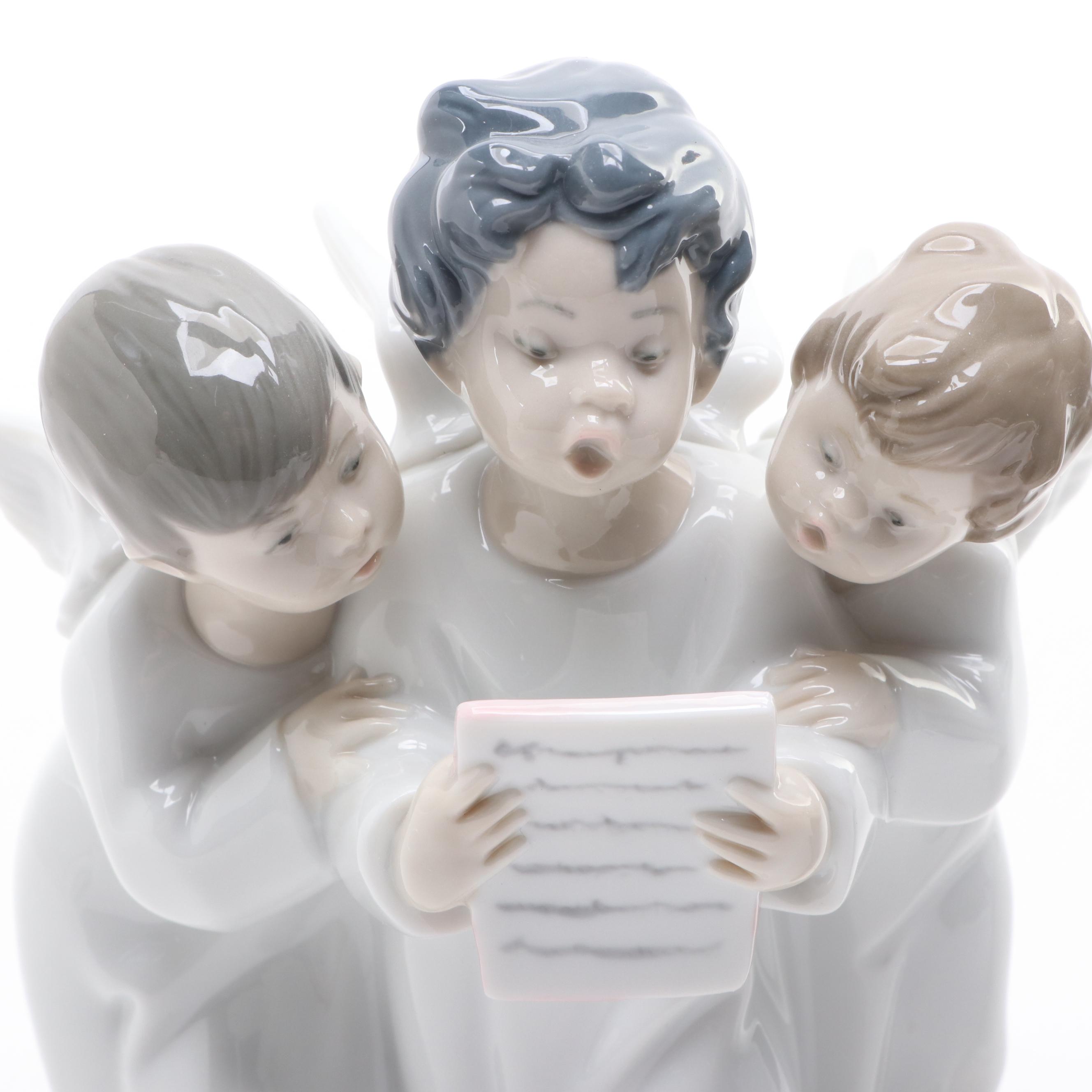 Lladró "Angels Group" and "Angel with Flute" Porcelain Figurines