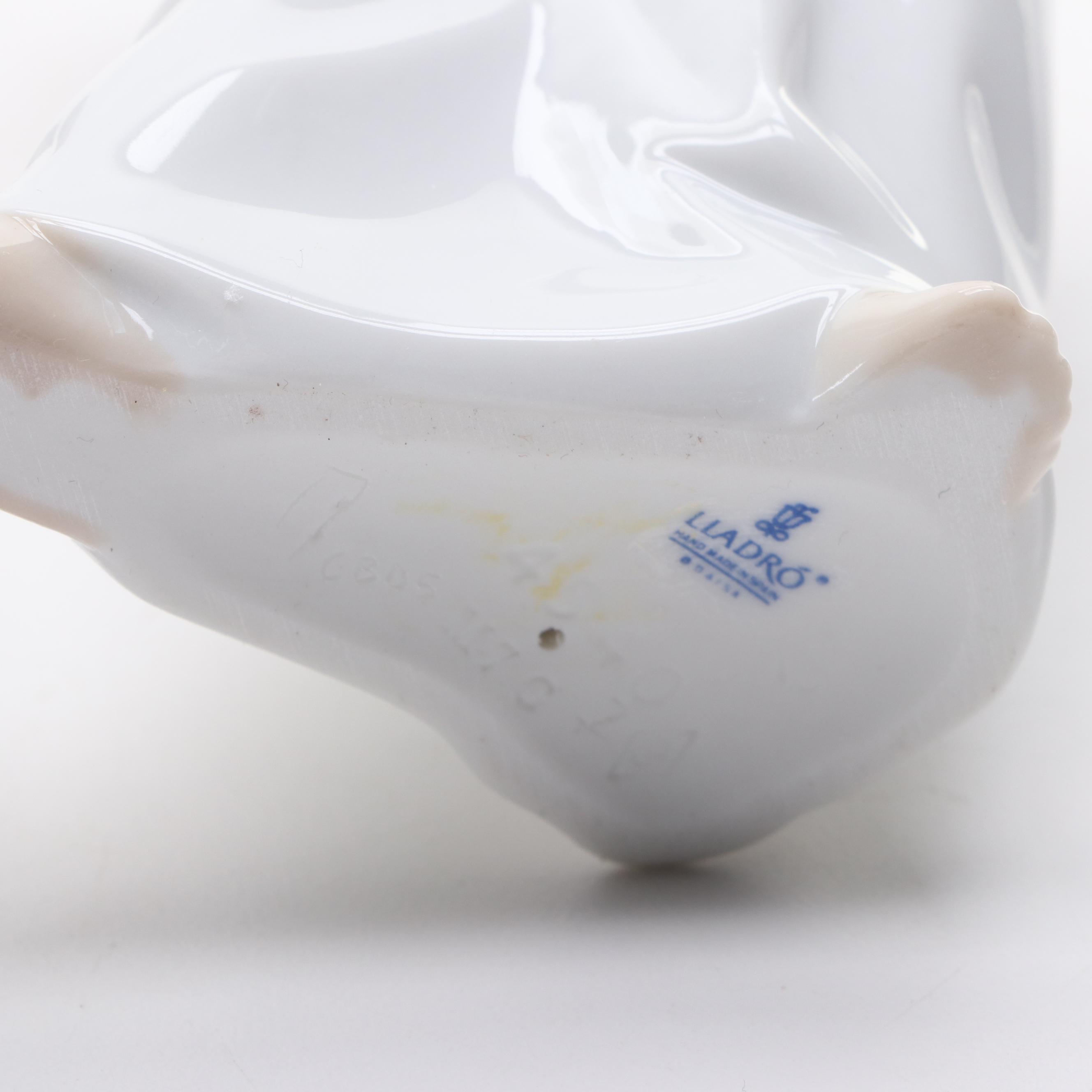 Lladró "Angels Group" and "Angel with Flute" Porcelain Figurines