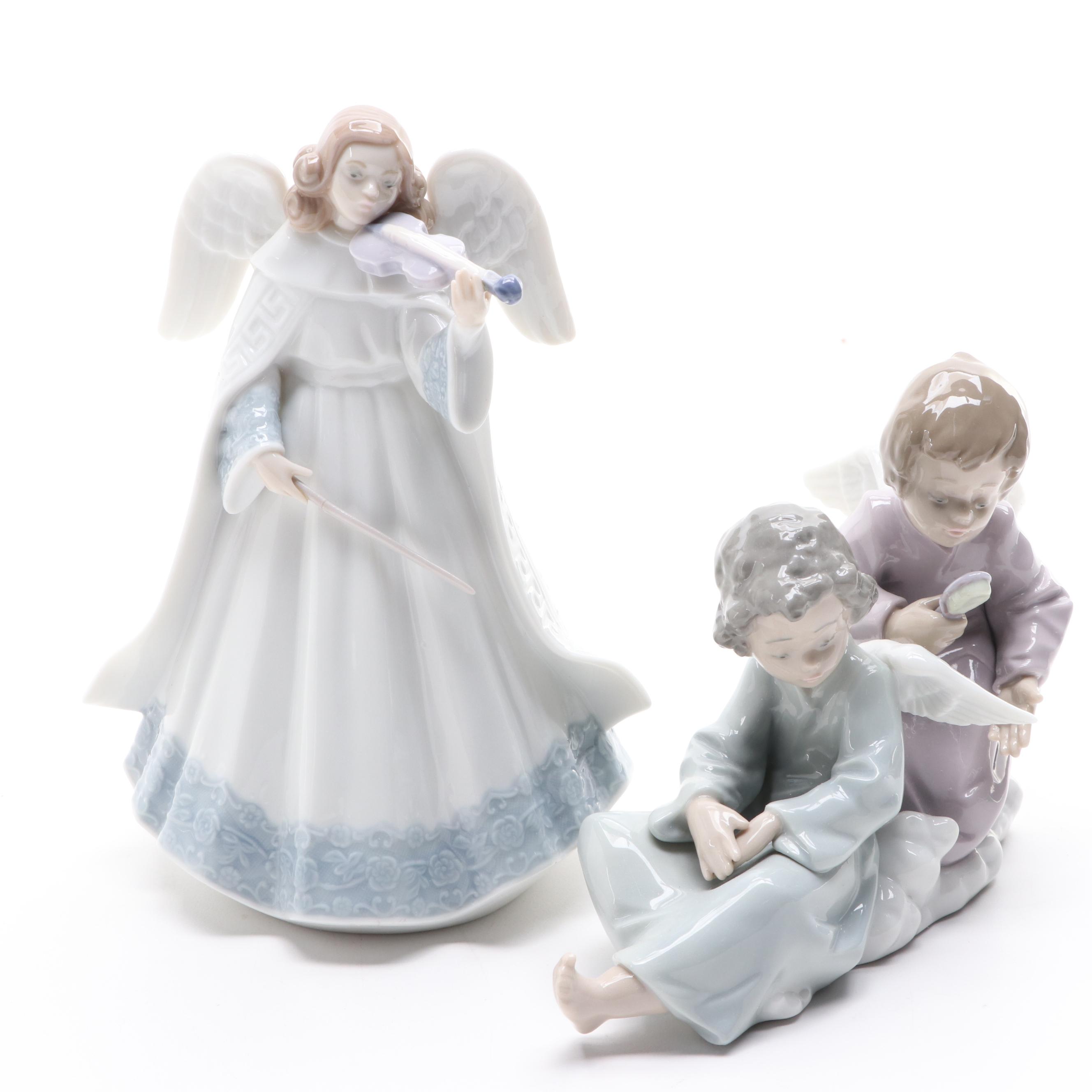 Lladró "Angelic Violinist" Tree Topper and "Angel Care" Porcelain Figurine