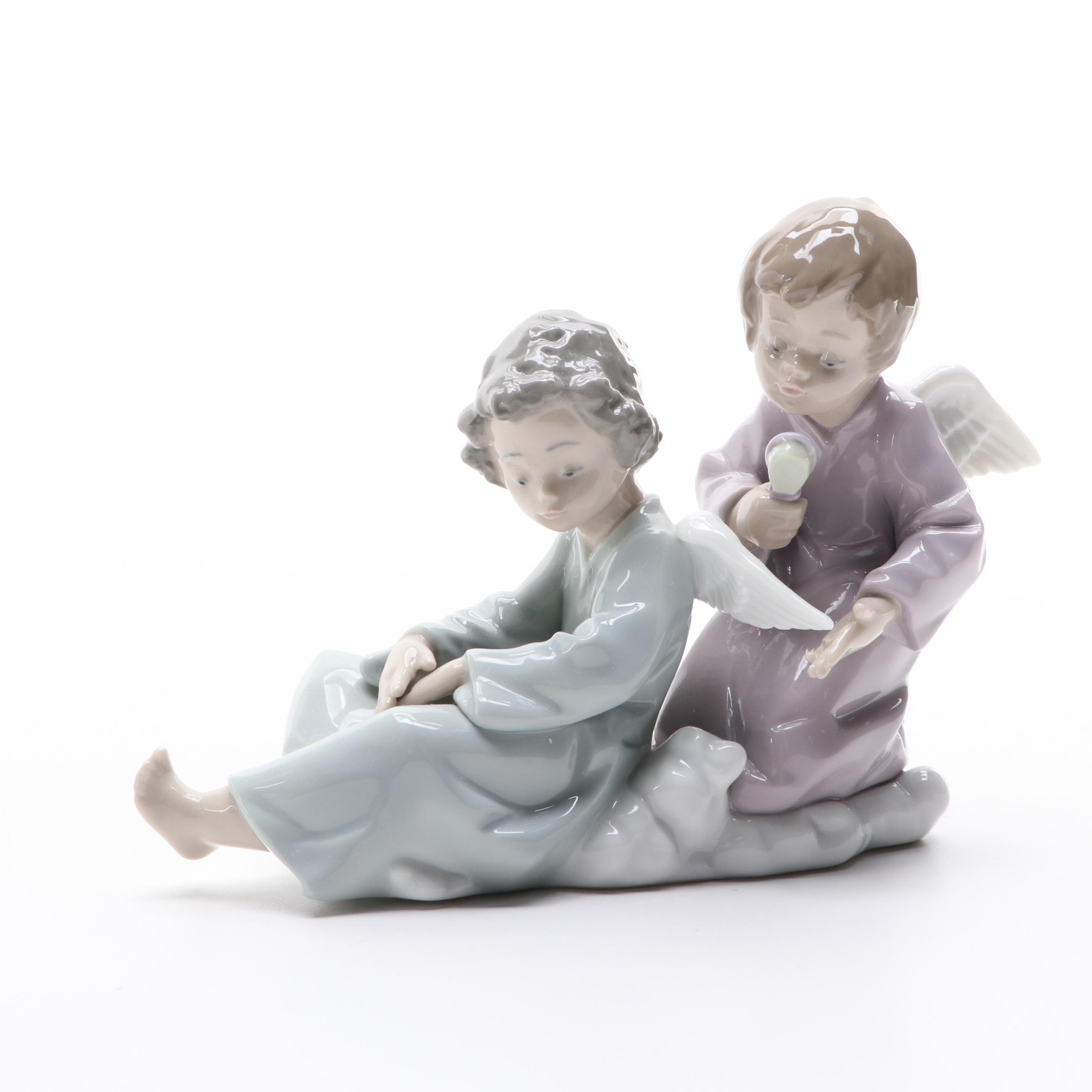 Lladró "Angelic Violinist" Tree Topper and "Angel Care" Porcelain Figurine