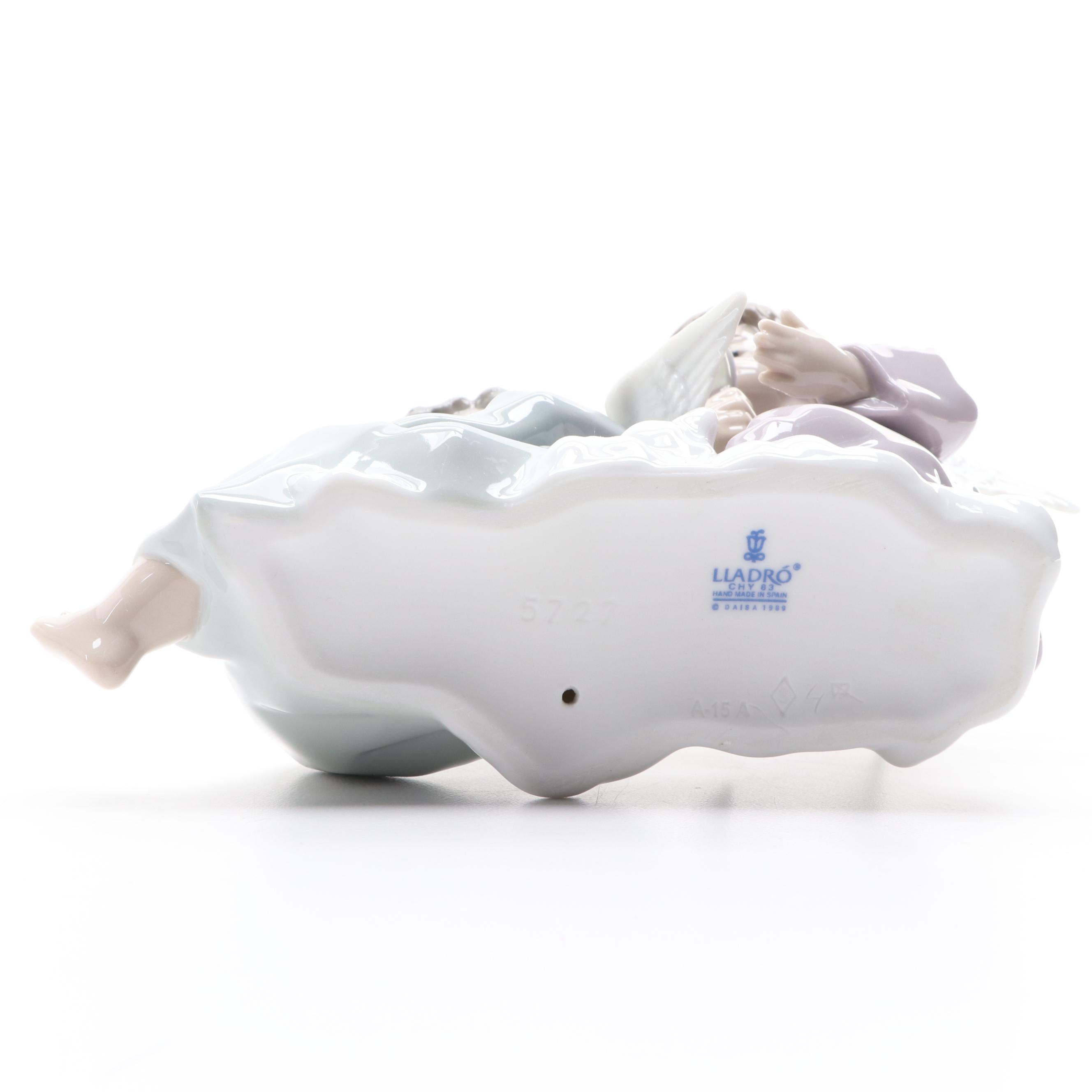 Lladró "Angelic Violinist" Tree Topper and "Angel Care" Porcelain Figurine