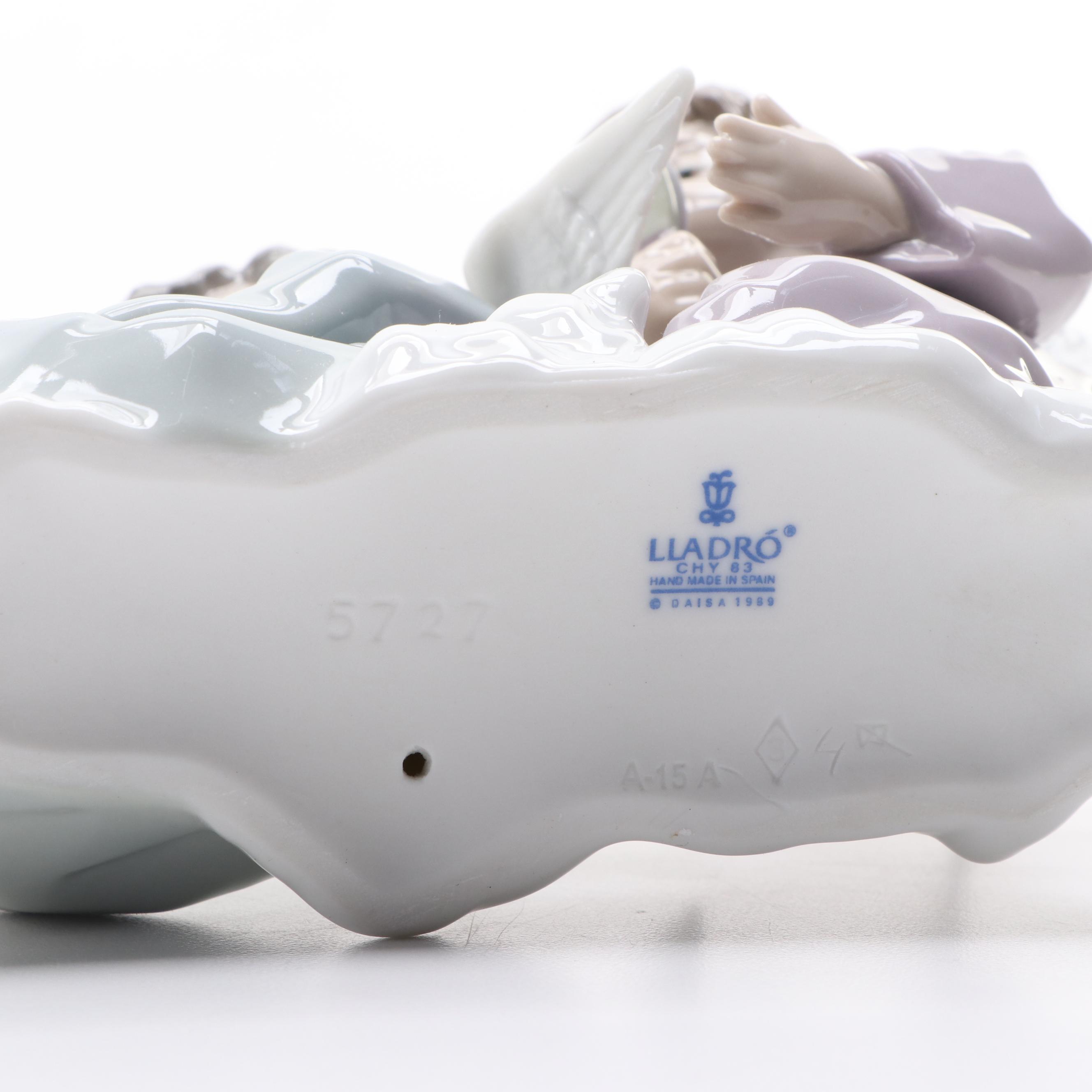 Lladró "Angelic Violinist" Tree Topper and "Angel Care" Porcelain Figurine