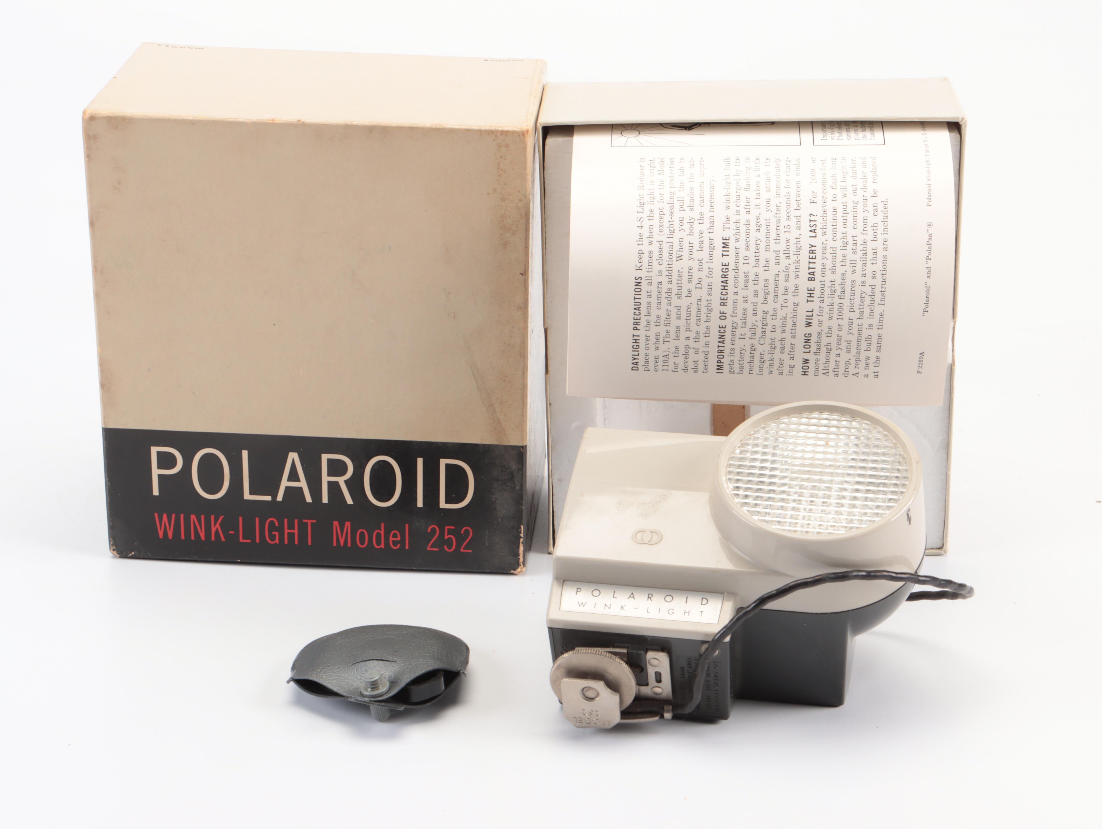 Polaroid One Step and Land Cameras, Polaroid Flashguns, Wink Light and More