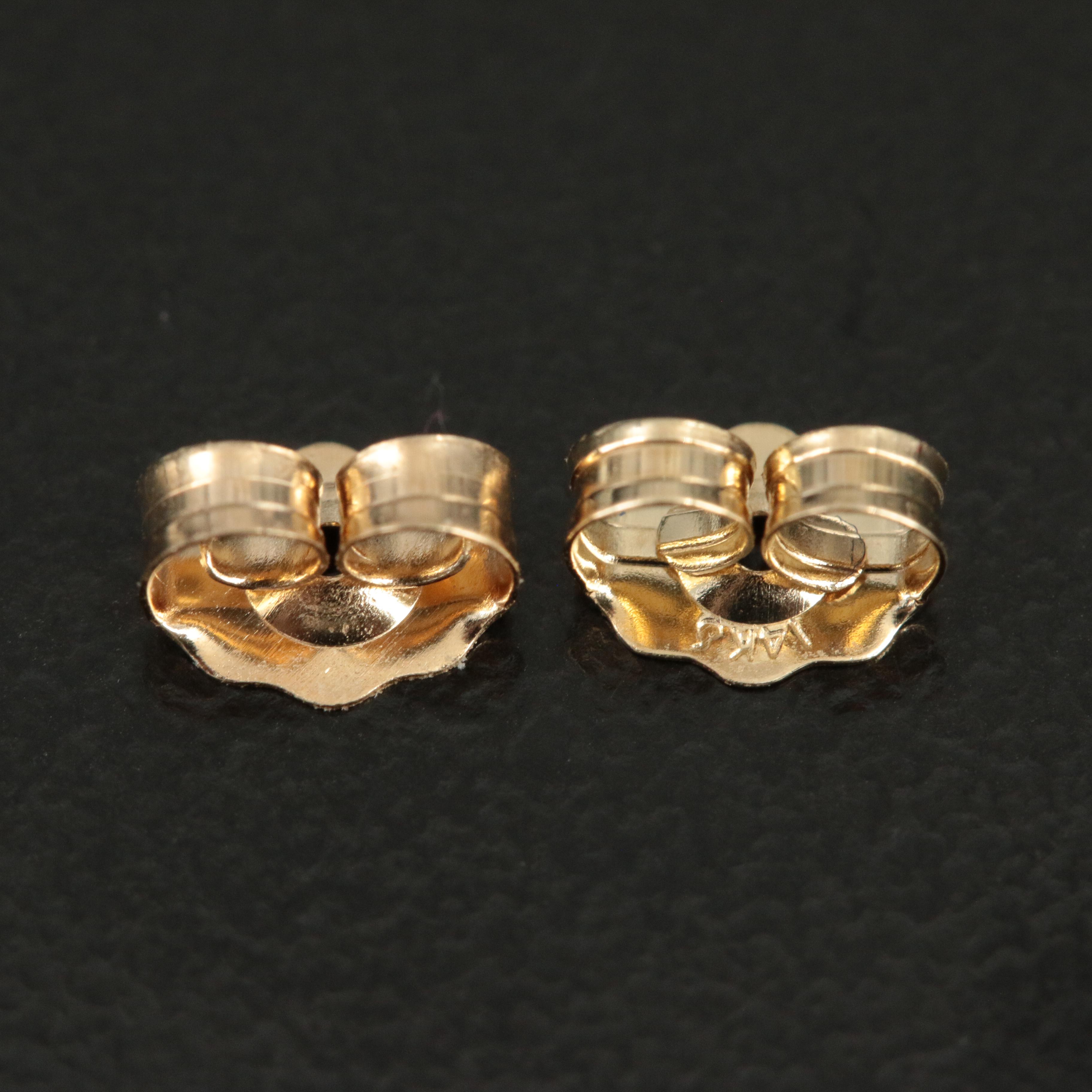 14K Ruby and 0.33 CTW Diamond Earrings