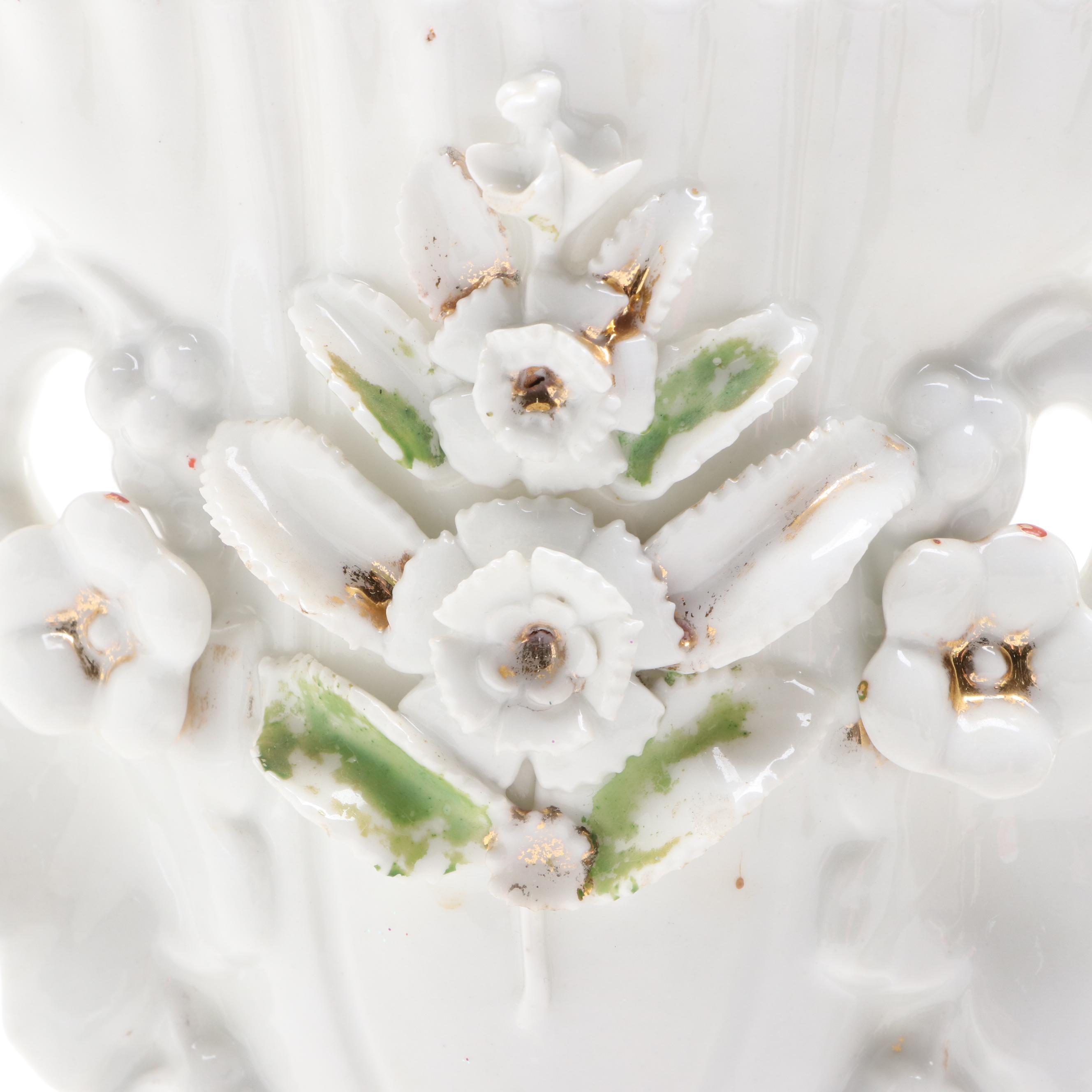 Painted Metal Rabbit Bookends with Floral Motif Porcelain Vase