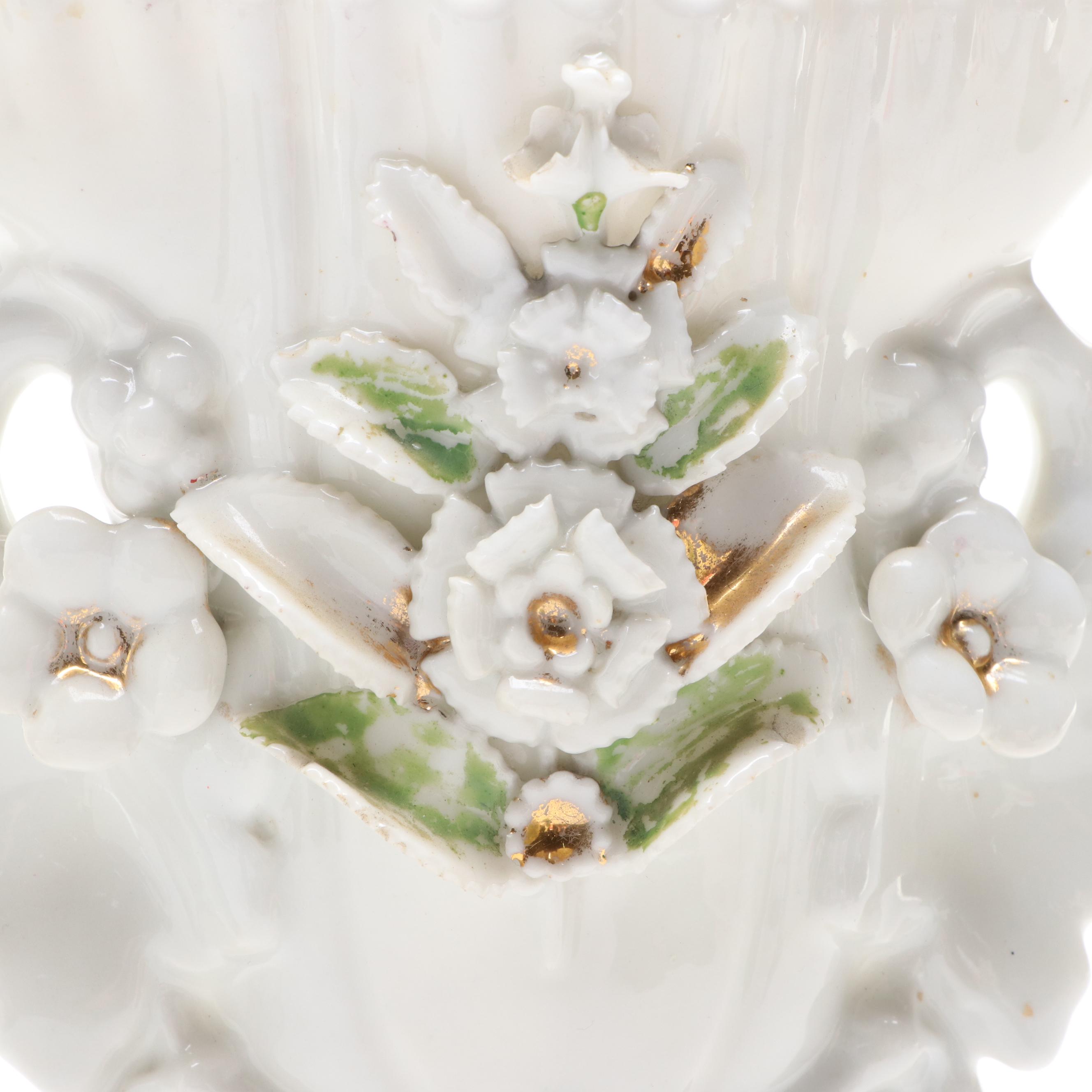 Painted Metal Rabbit Bookends with Floral Motif Porcelain Vase