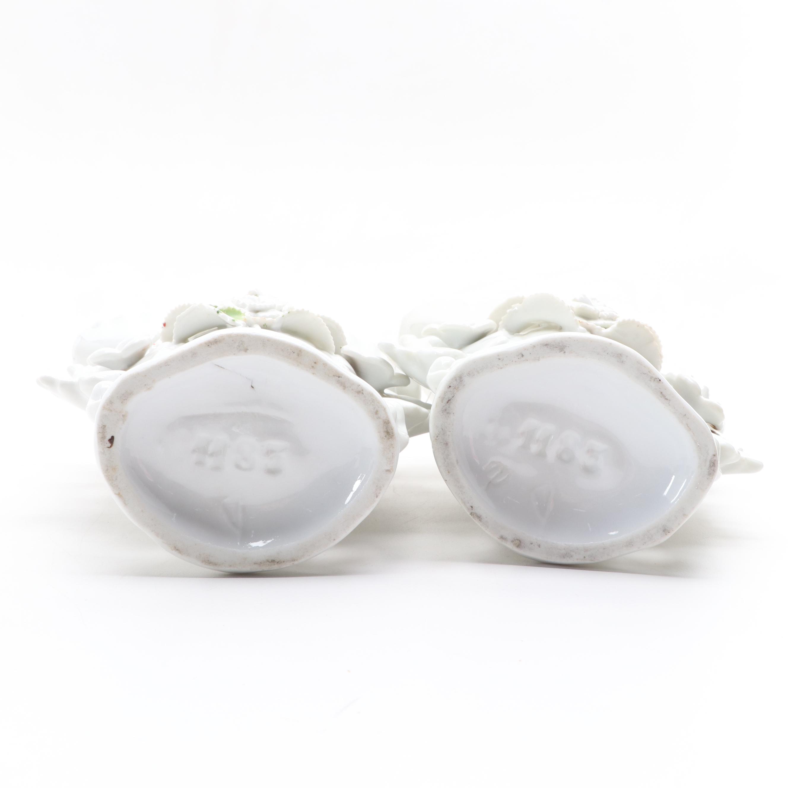 Painted Metal Rabbit Bookends with Floral Motif Porcelain Vase