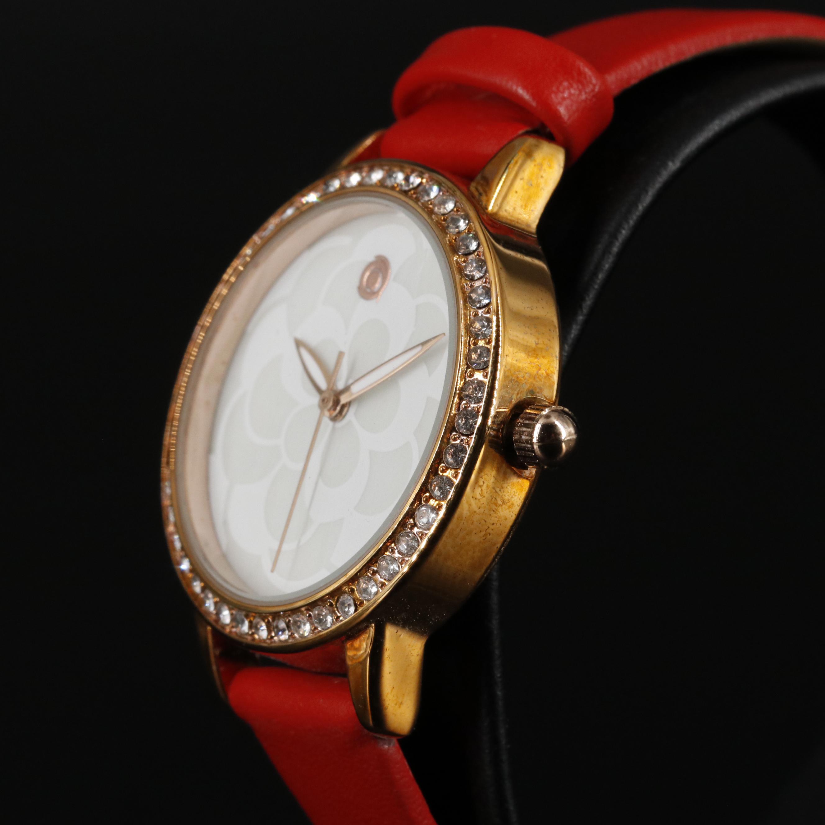 Magnicor Quartz Watch with Rhinestone Bezel and Red Strap