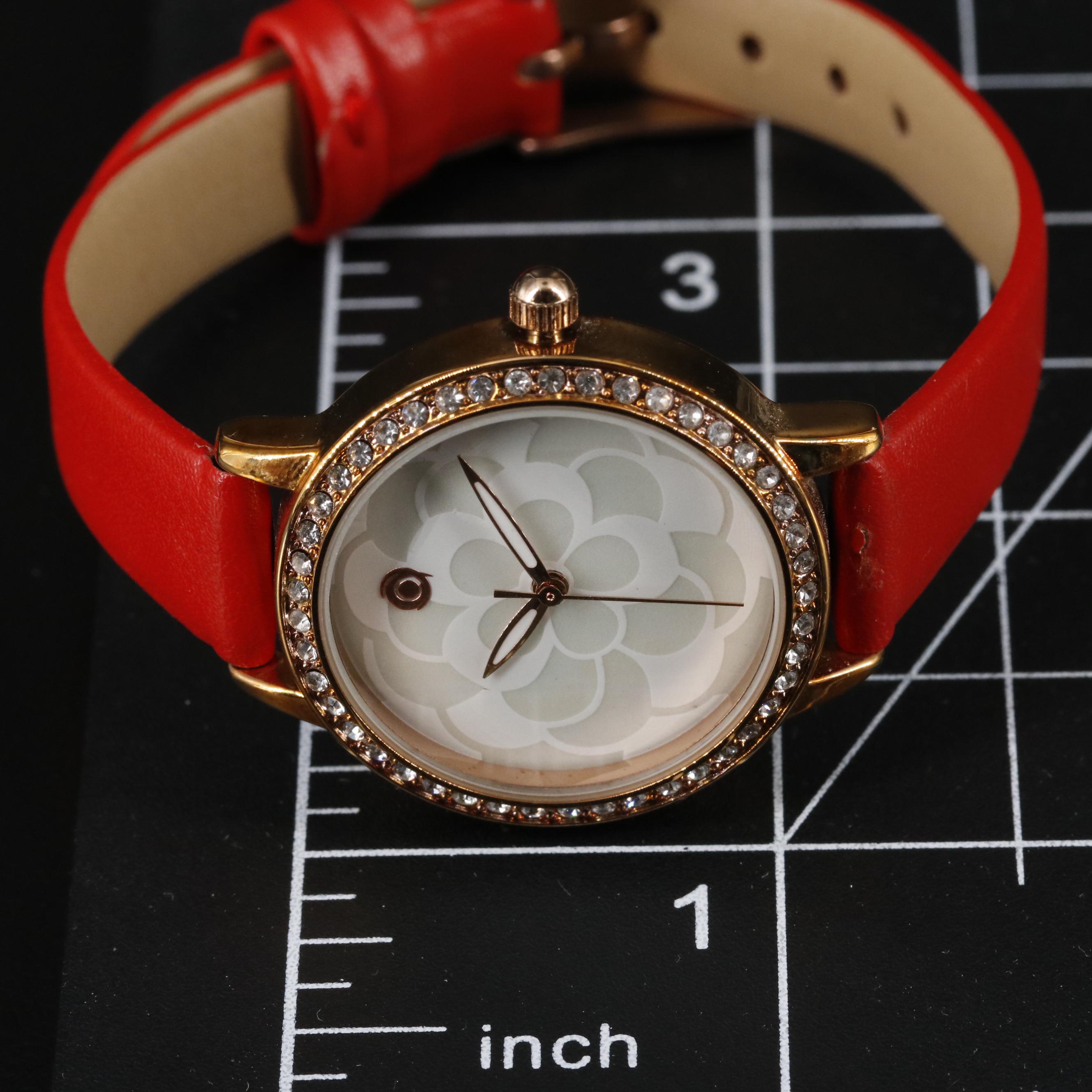 Magnicor Quartz Watch with Rhinestone Bezel and Red Strap