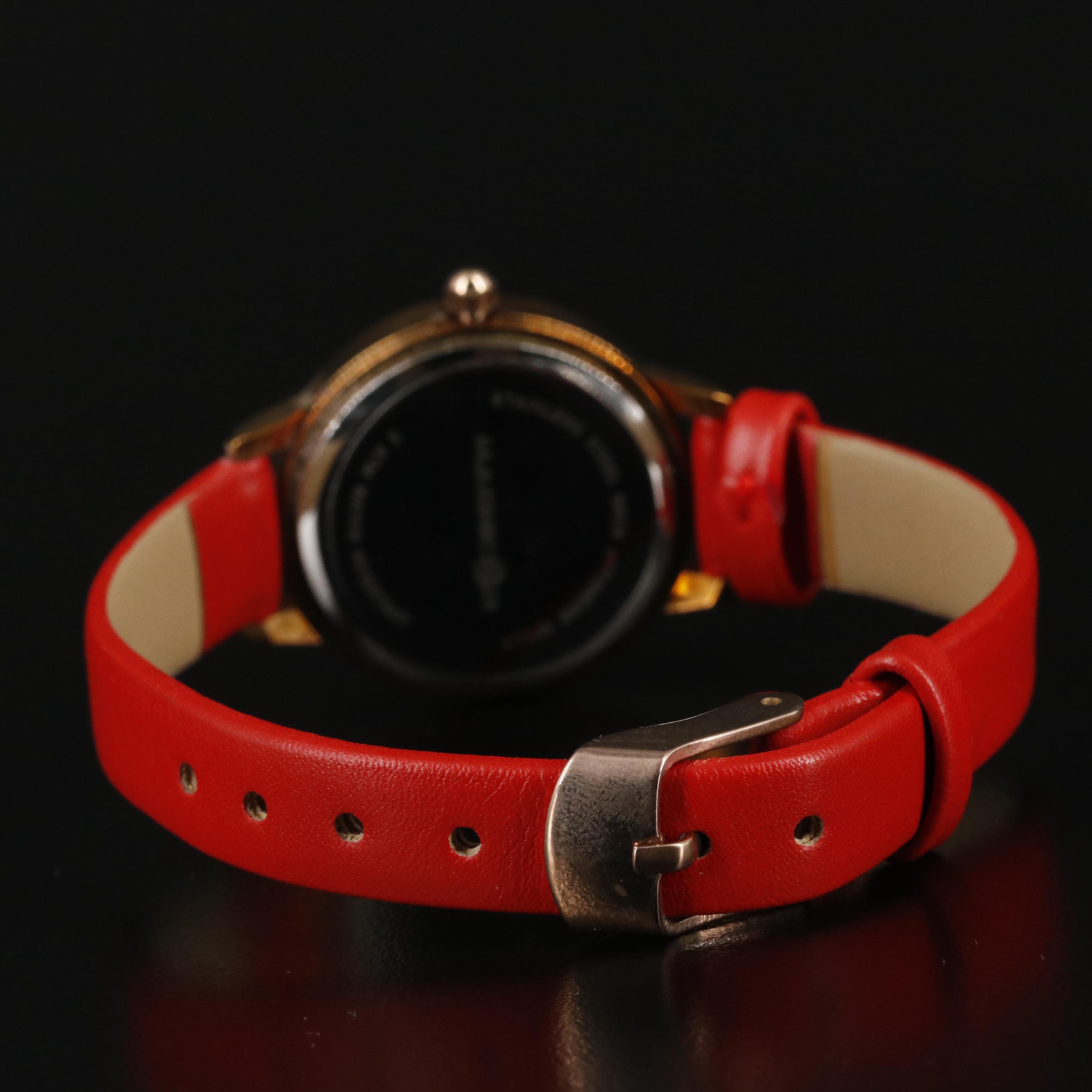 Magnicor Quartz Watch with Rhinestone Bezel and Red Strap