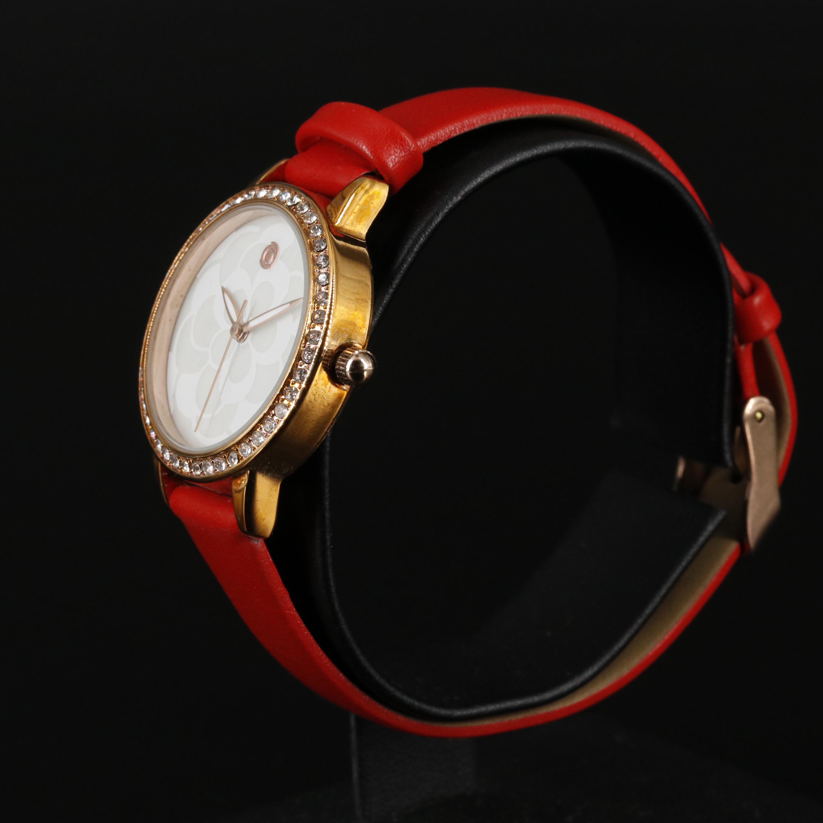 Magnicor Quartz Watch with Rhinestone Bezel and Red Strap