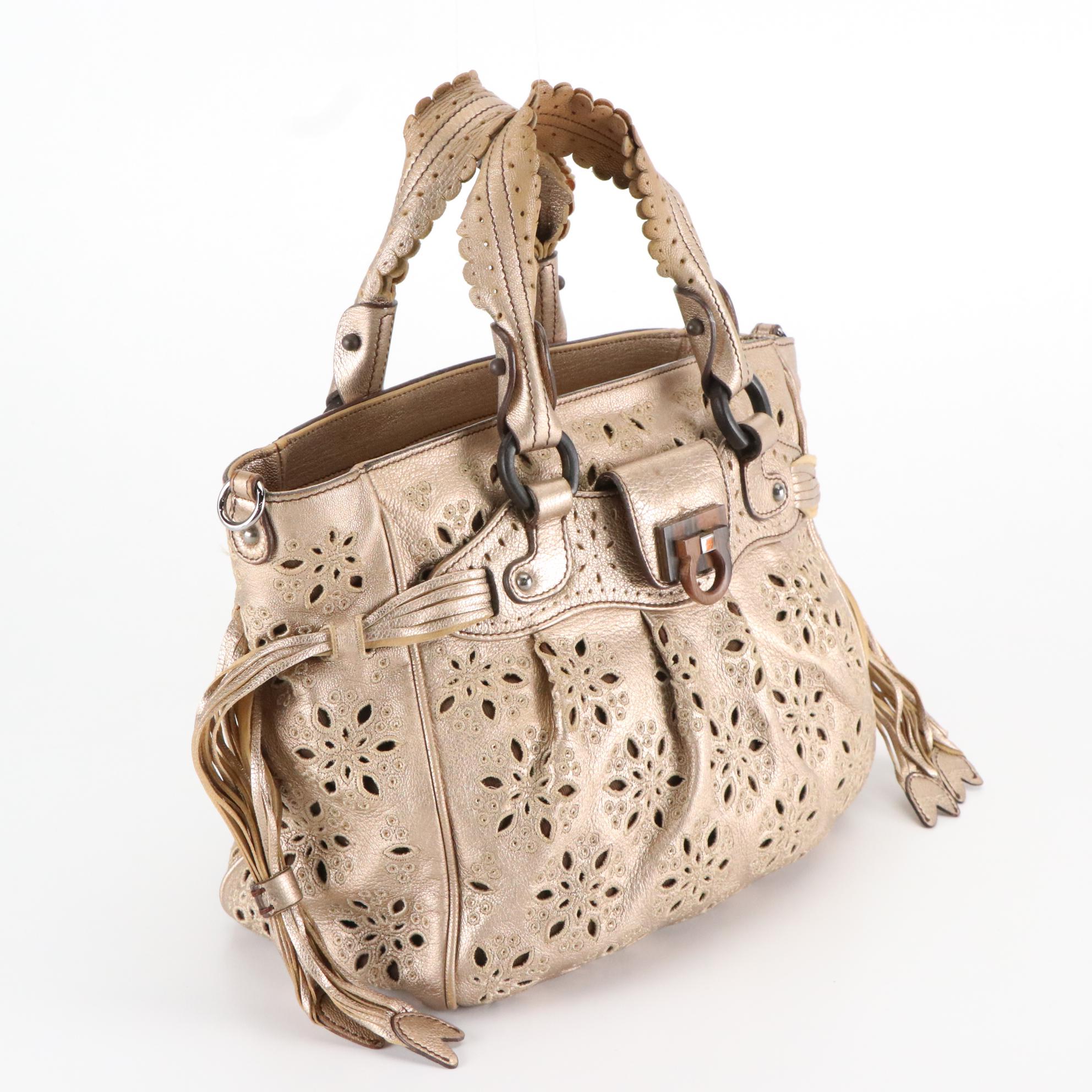 Salvatore Ferragamo Handbag in Eyelet Perforated Metallic Leather
