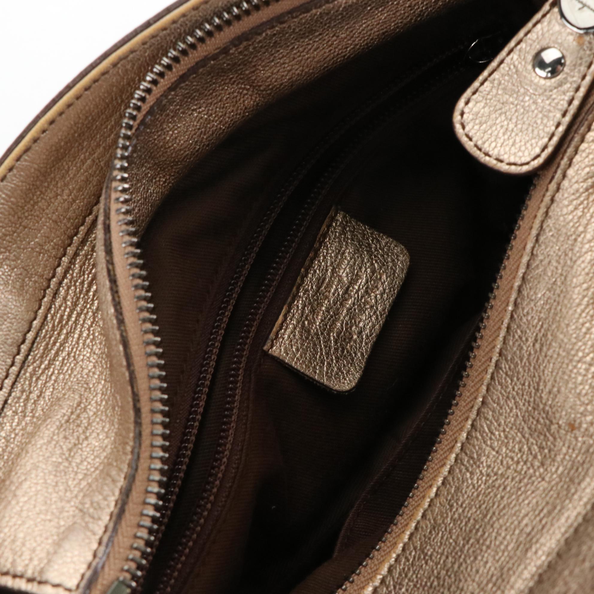 Salvatore Ferragamo Handbag in Eyelet Perforated Metallic Leather