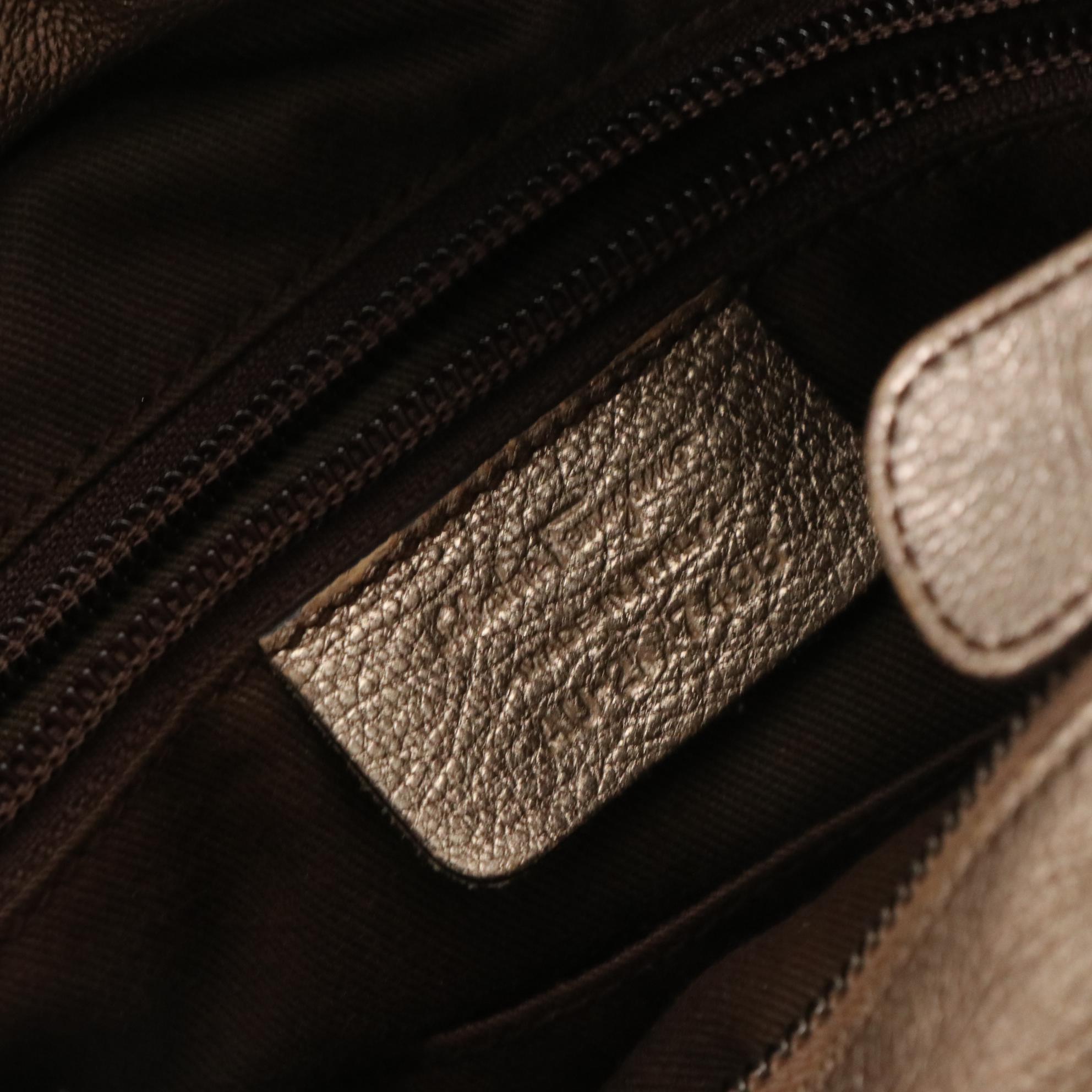 Salvatore Ferragamo Handbag in Eyelet Perforated Metallic Leather