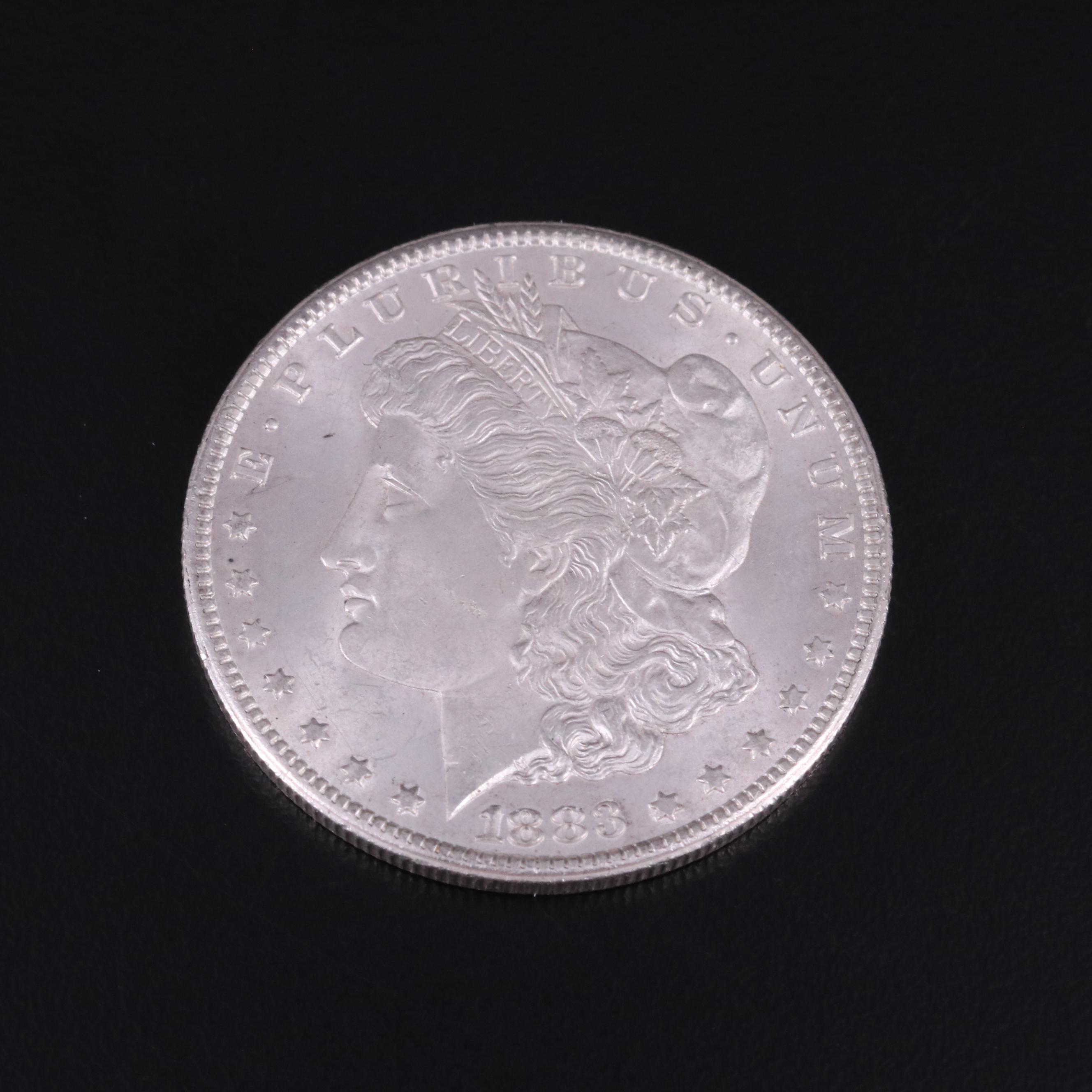 Group of Three Uncirculated Carson City Morgan Silver Dollars