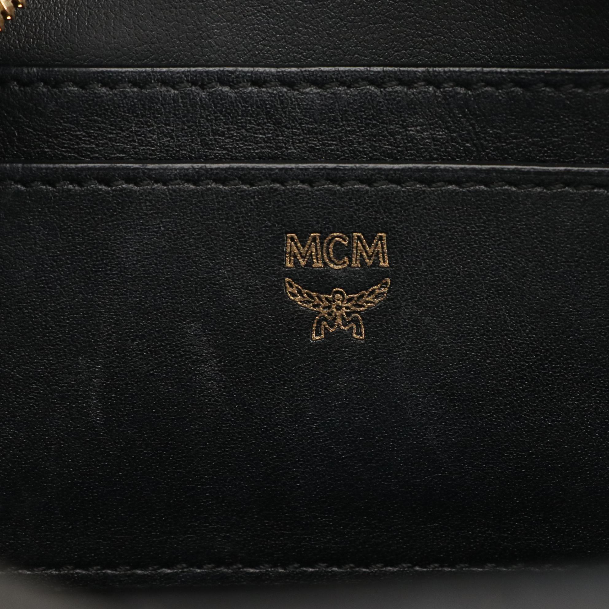 MCM Mini Visetos Leather Studded Backpack