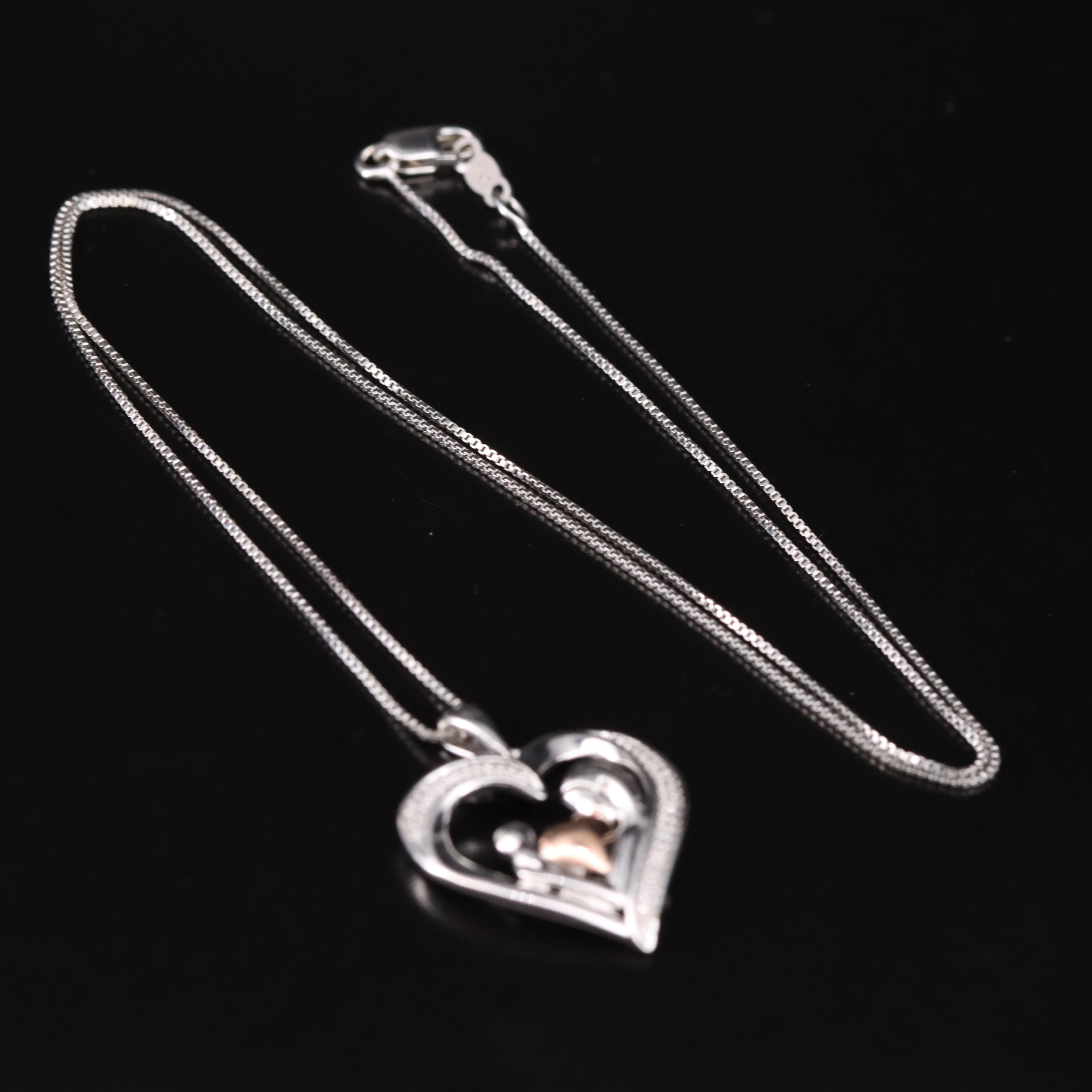 Sterling Silver Diamond Mother and Child Heart Necklace with a 10K Accent