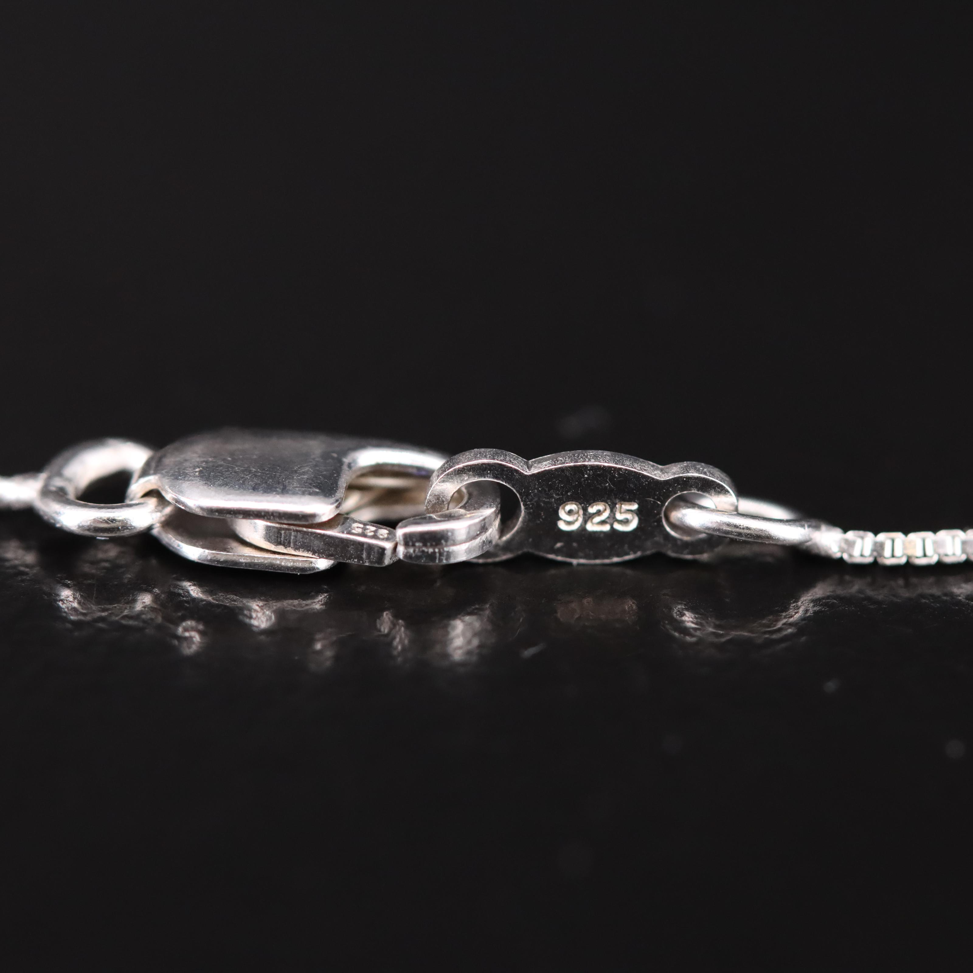 Sterling Silver Diamond Mother and Child Heart Necklace with a 10K Accent