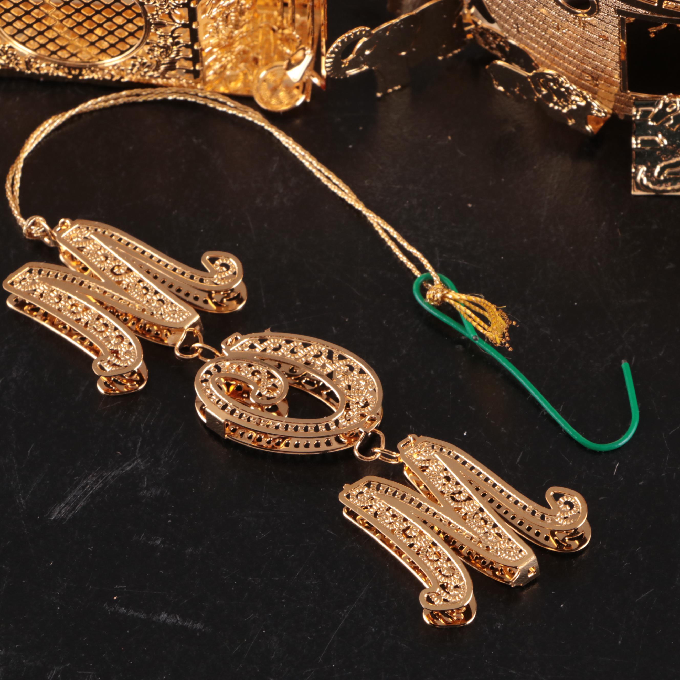 The Danbury Mint Annual Gold Metal Christmas Ornaments