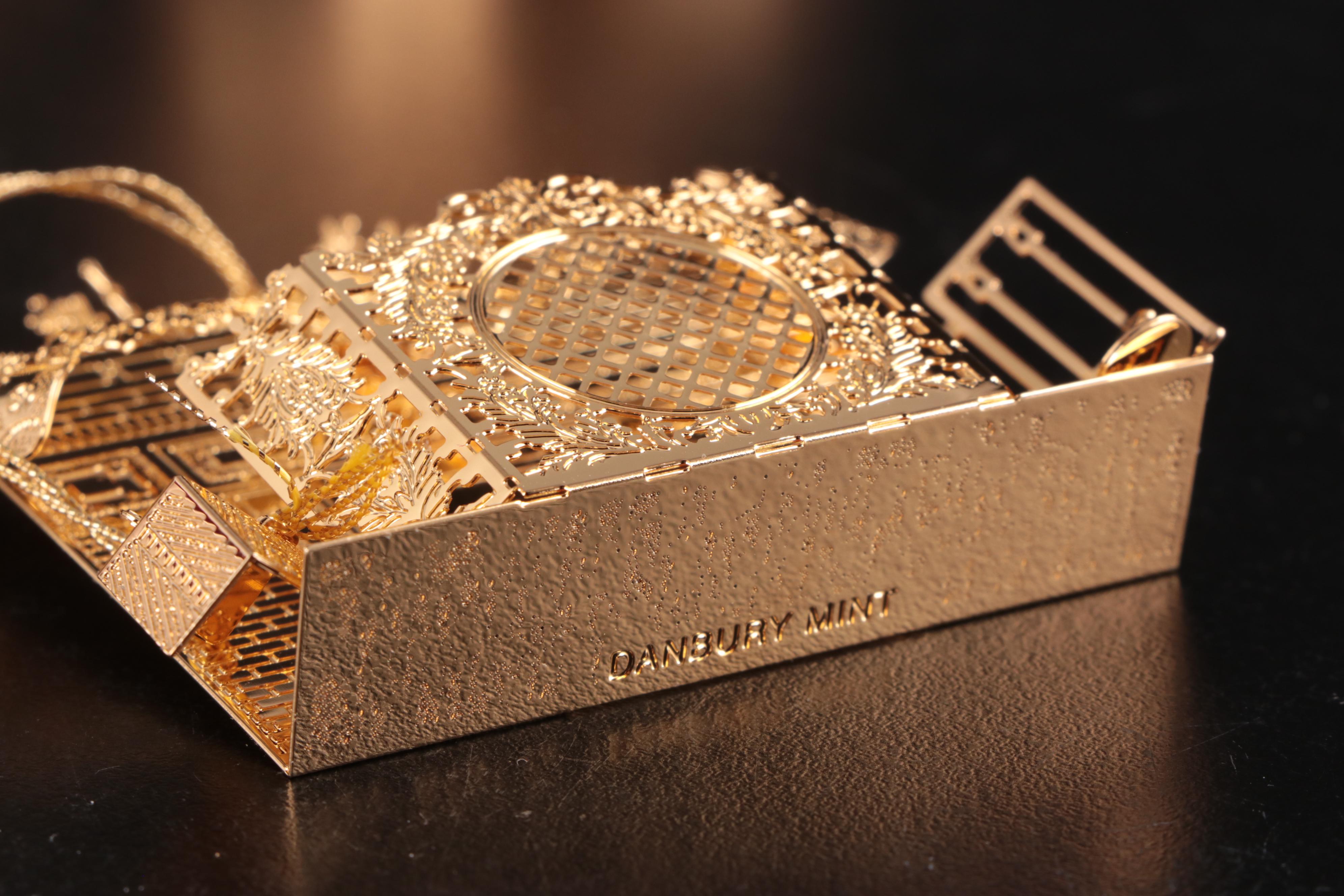 The Danbury Mint Annual Gold Metal Christmas Ornaments