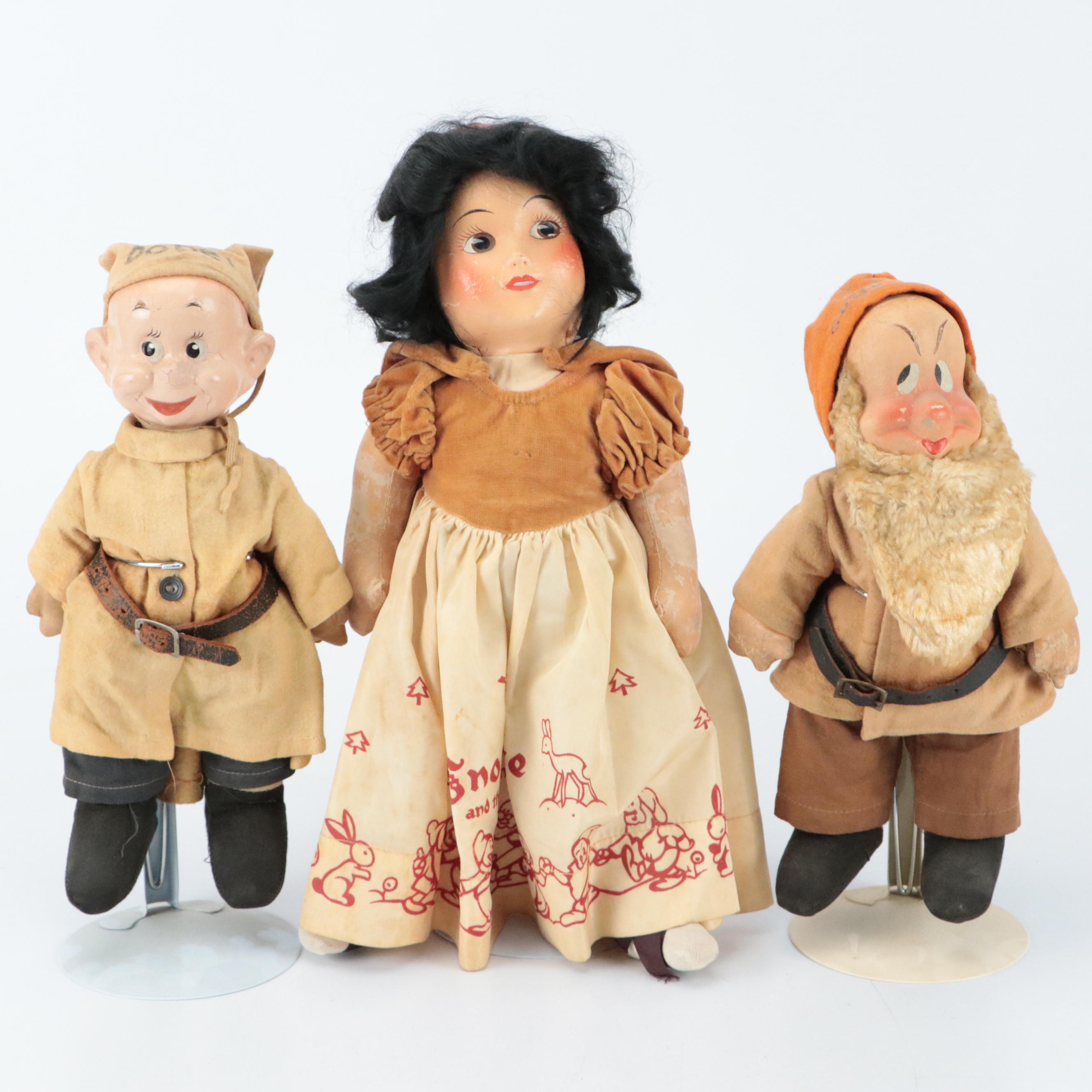 Ideal Novelty & Toy Co. Dopey with Other Snow White and Dwarf Dolls, circa 1937