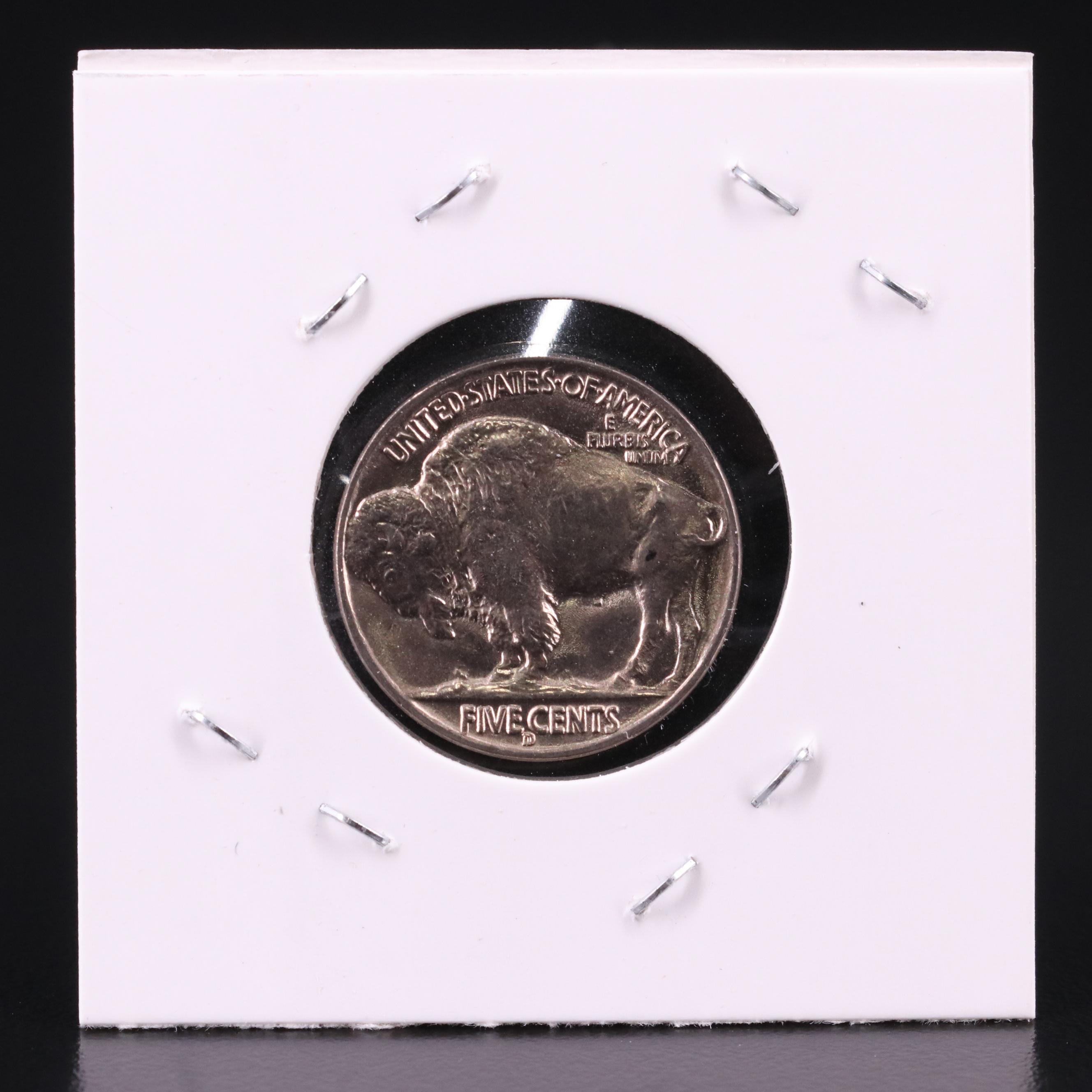 Seven Uncirculated 1938-D Buffalo Nickels