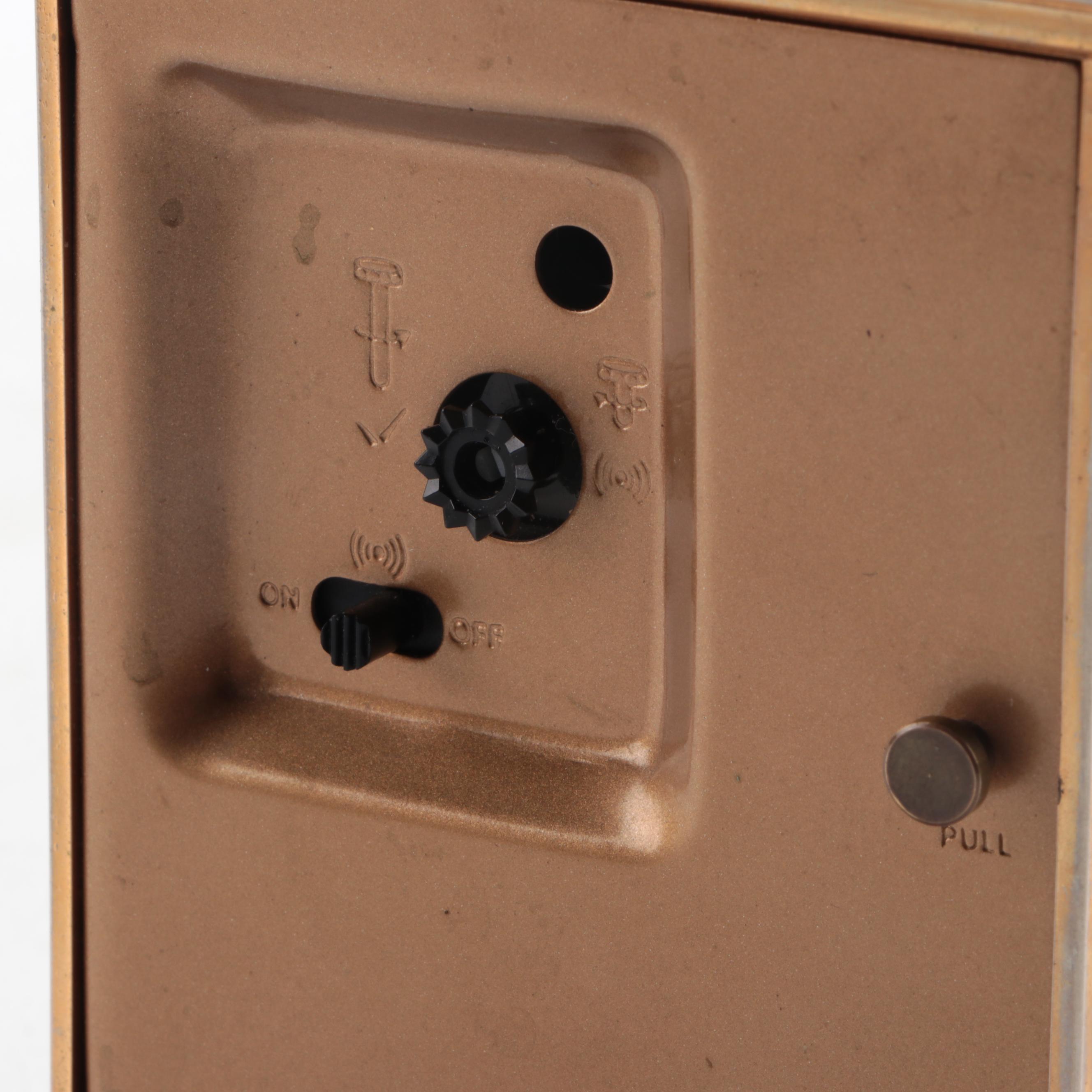 Howard Miller Gilt Metal and Black Enamel Carriage Clock