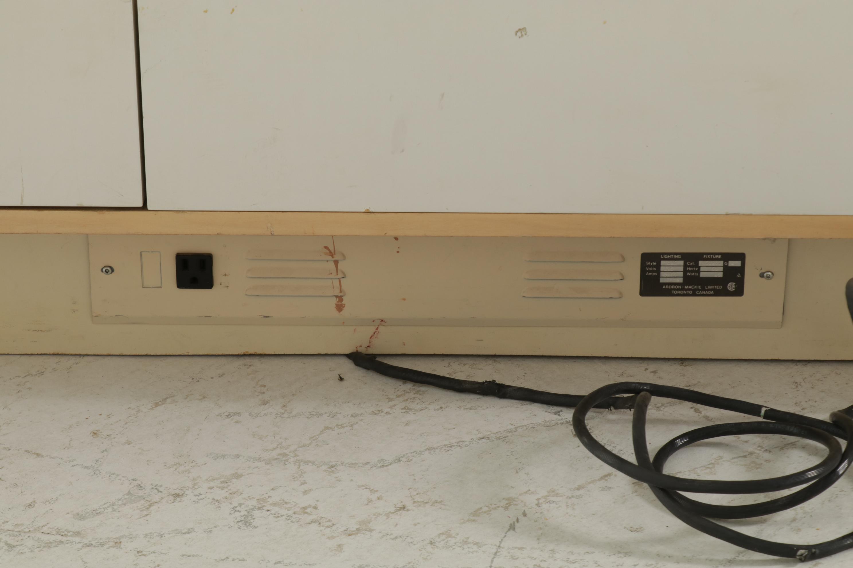 Two Modernist Lacquered Wood and Glass Retail Display Cases