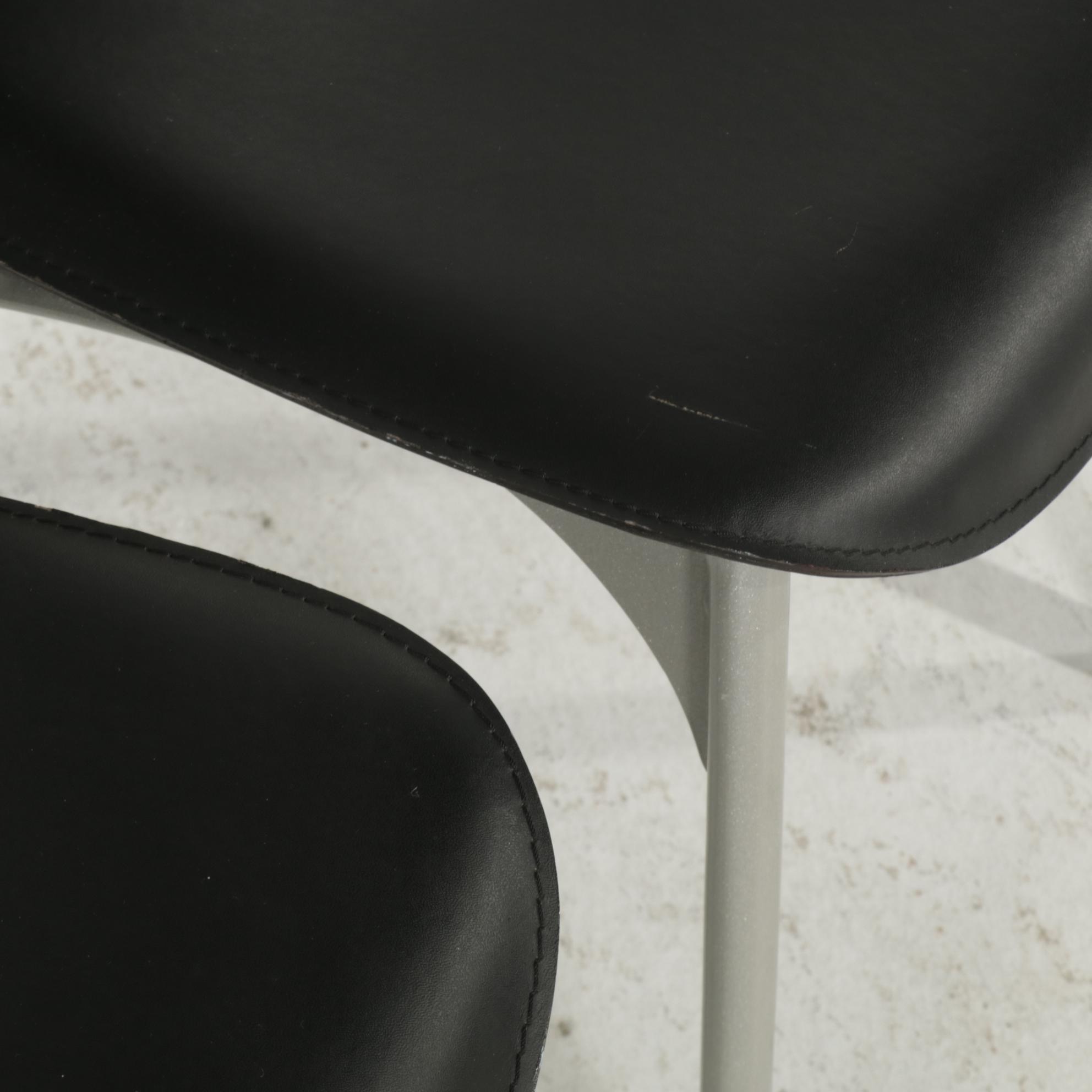 Four Modernist Style Faux Leather and Metal High-Back Dining Chairs