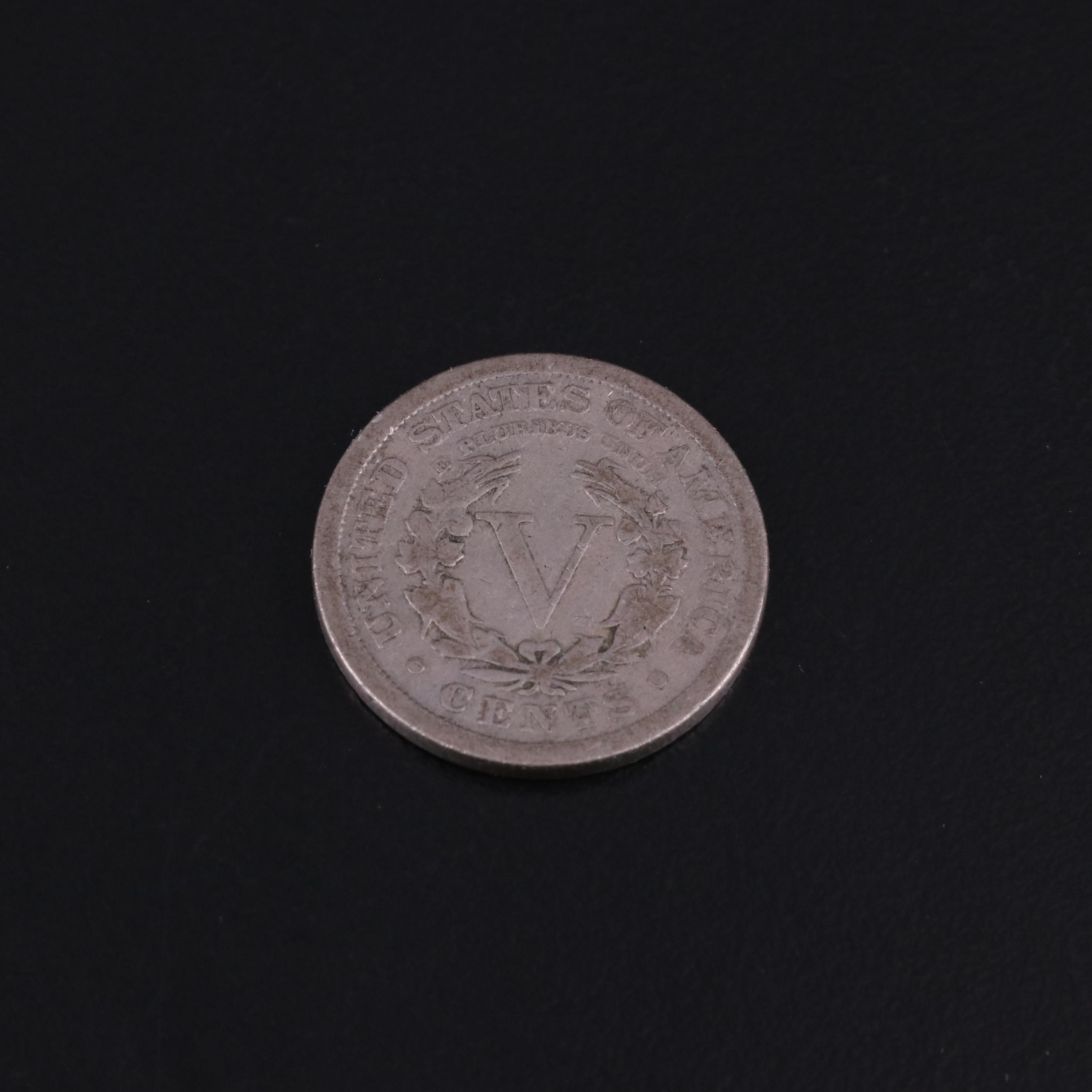 Collection of Eighteen United States Coins and a Token