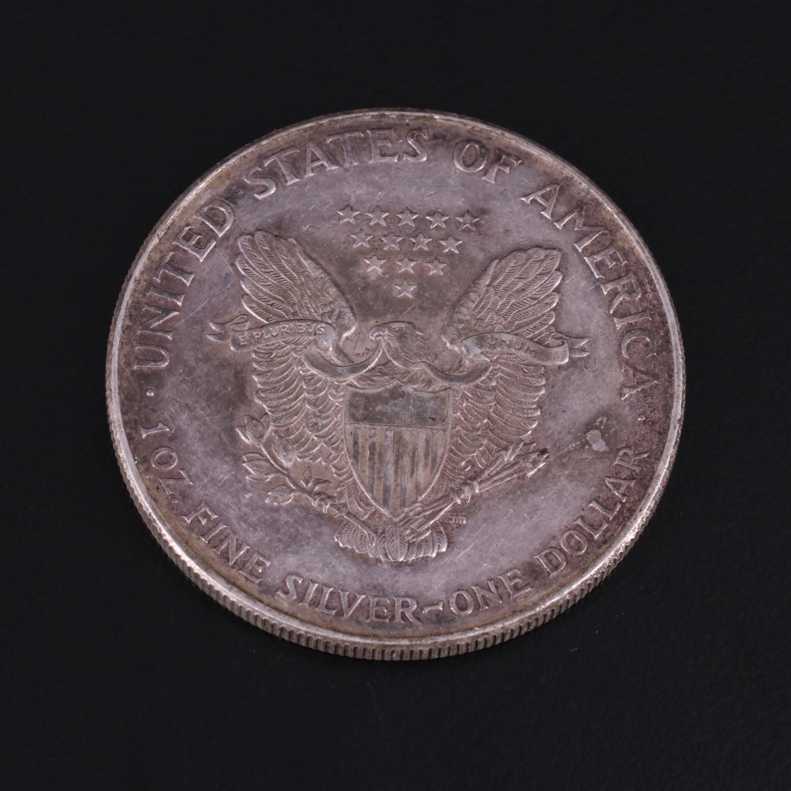 Collection of Eighteen United States Coins and a Token