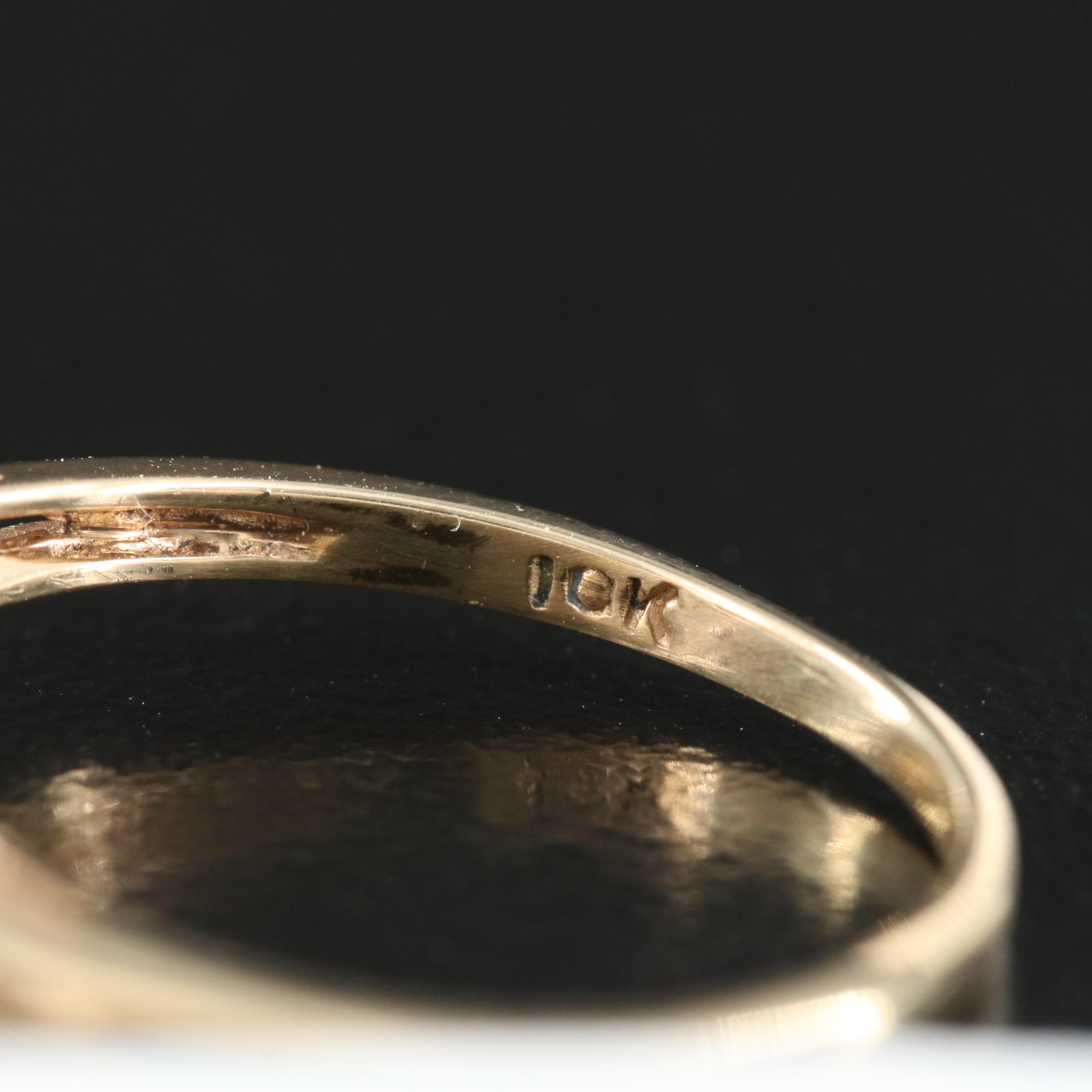 10K 0.05 CT Diamond Solitaire Ring