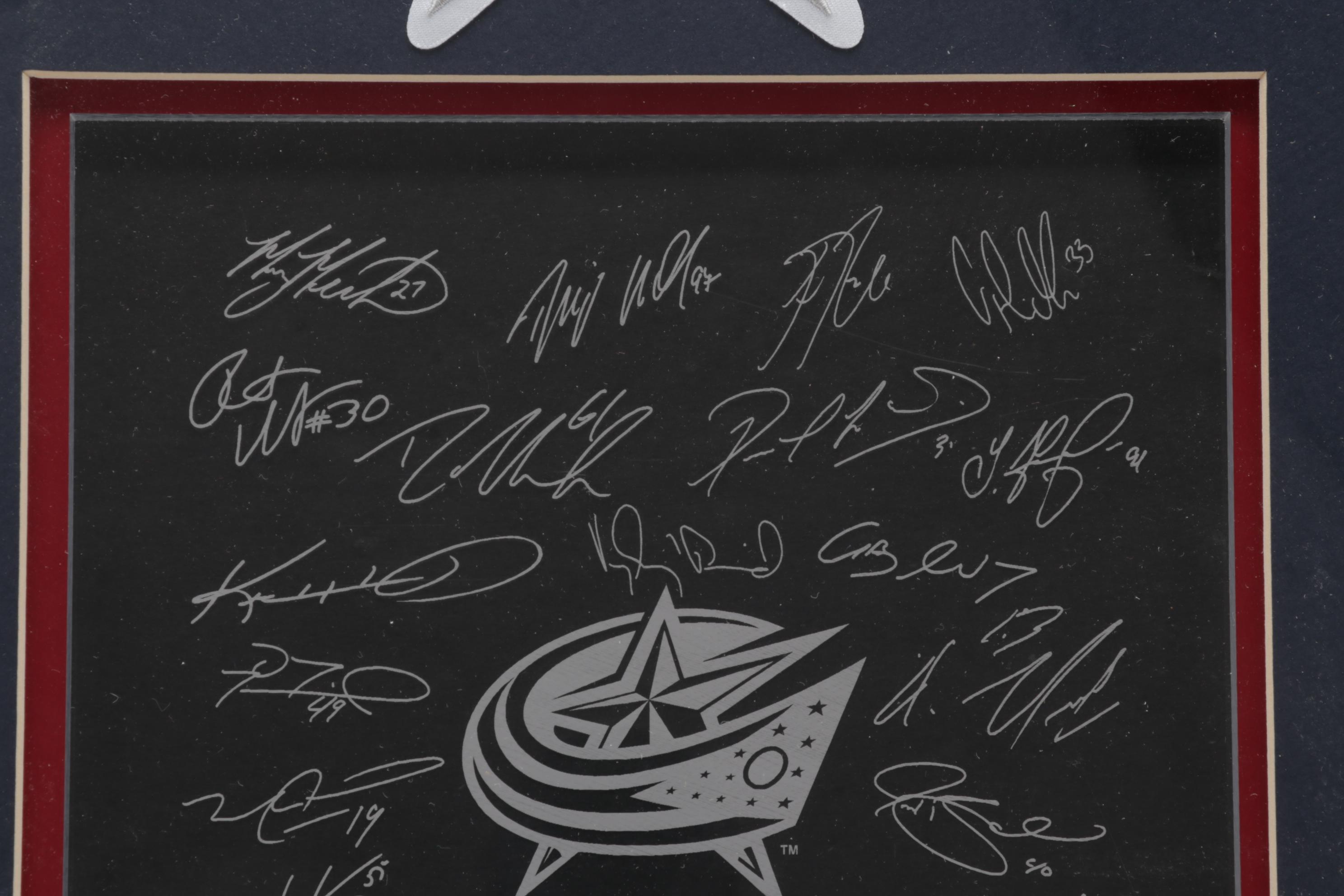 Columbus Blue Jackets Signed Helmet and Team Signed Framed Poster