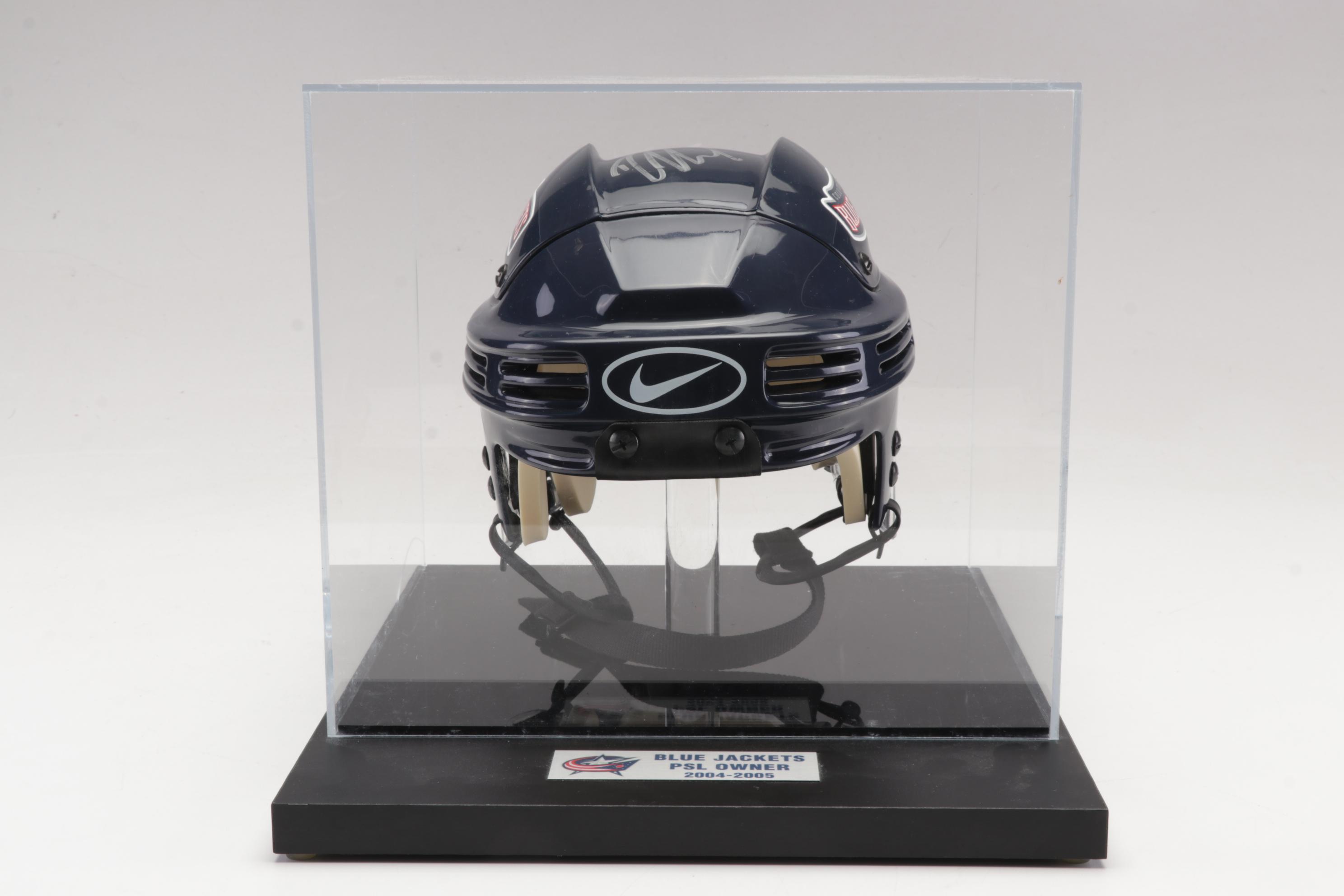 Columbus Blue Jackets Signed Helmet and Team Signed Framed Poster