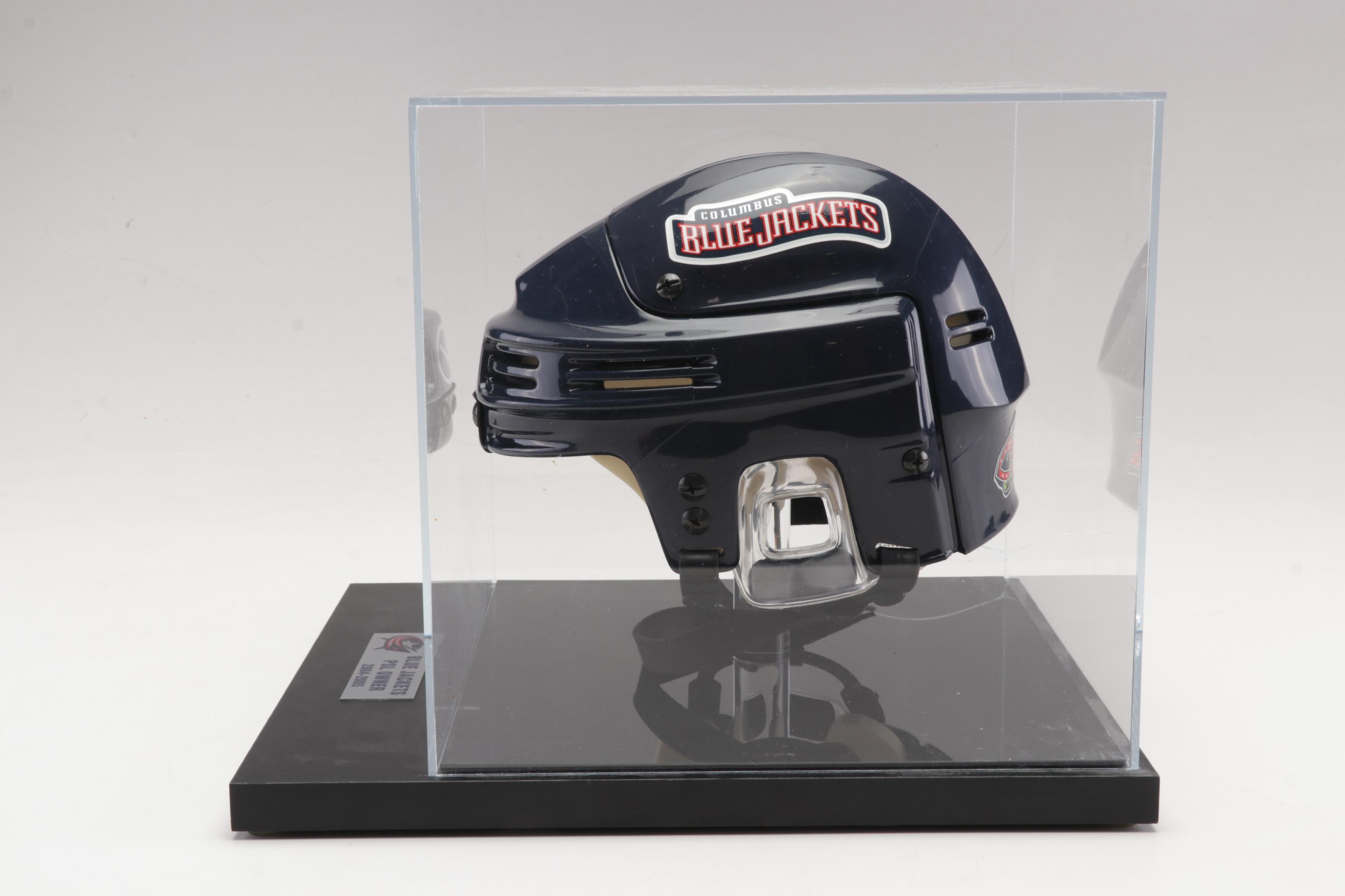 Columbus Blue Jackets Signed Helmet and Team Signed Framed Poster