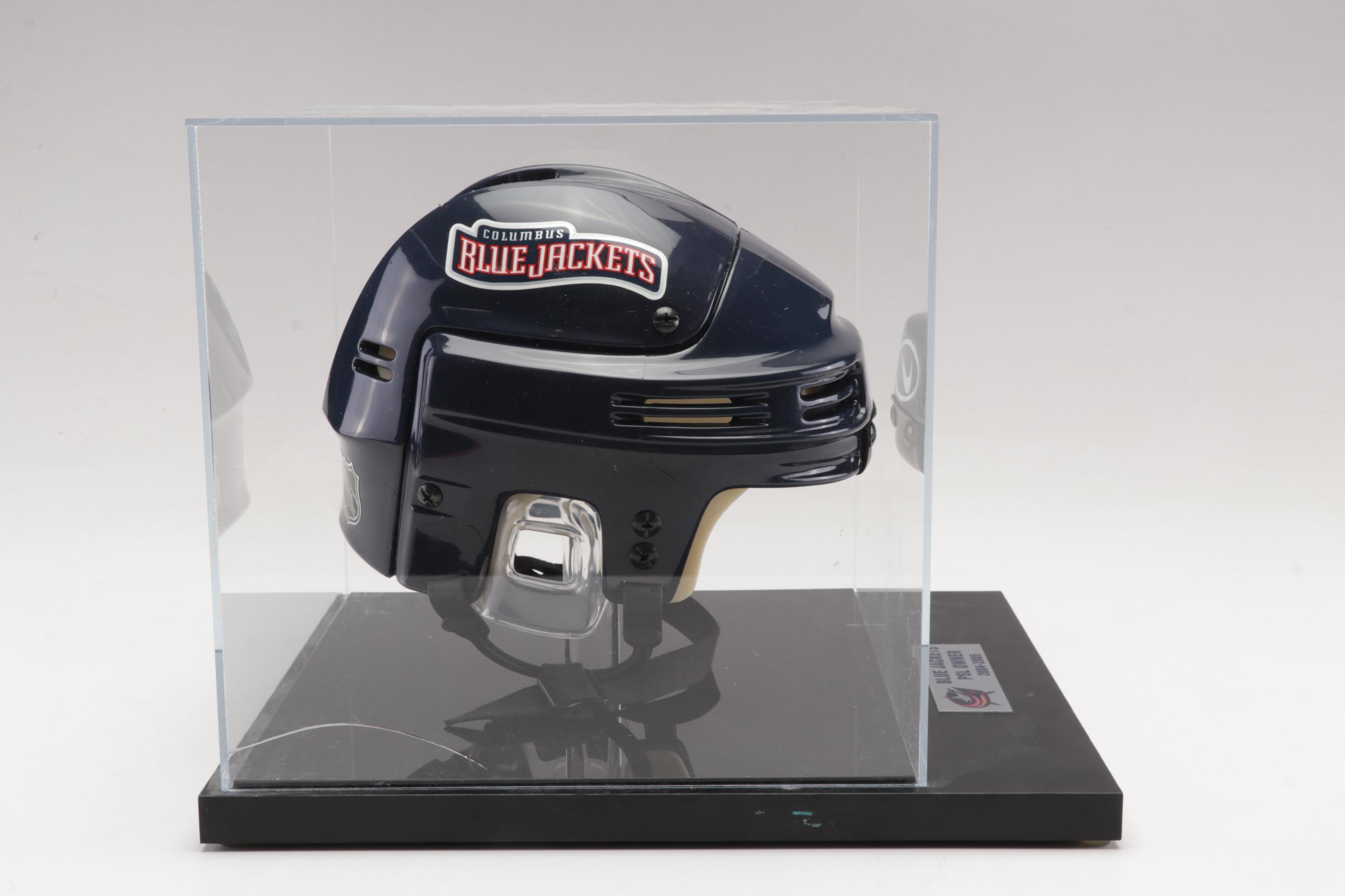 Columbus Blue Jackets Signed Helmet and Team Signed Framed Poster