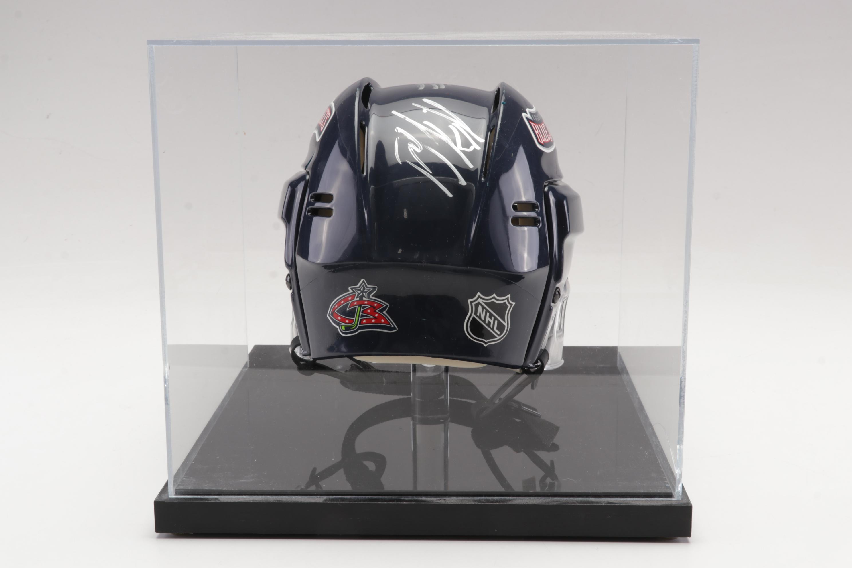 Columbus Blue Jackets Signed Helmet and Team Signed Framed Poster