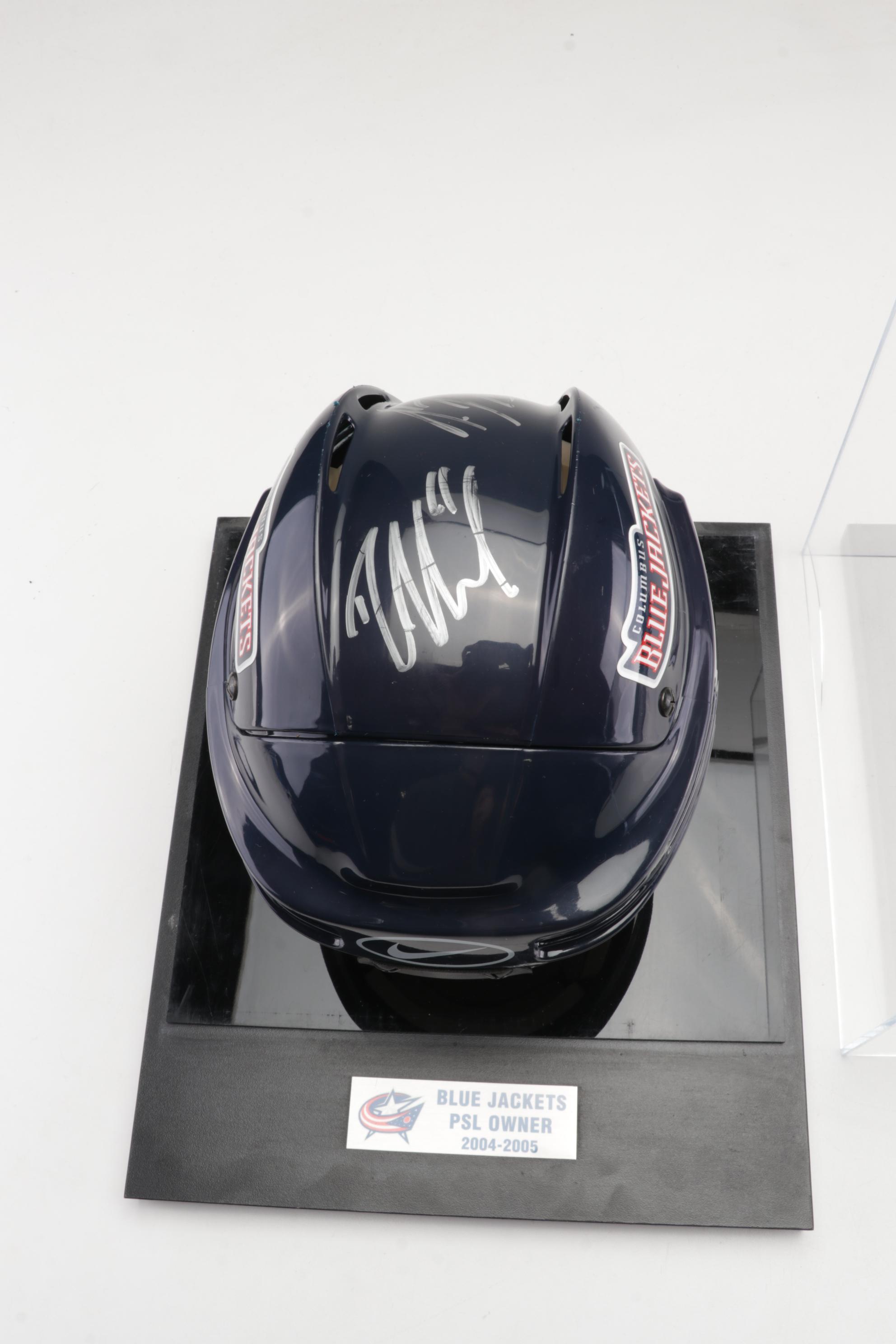 Columbus Blue Jackets Signed Helmet and Team Signed Framed Poster