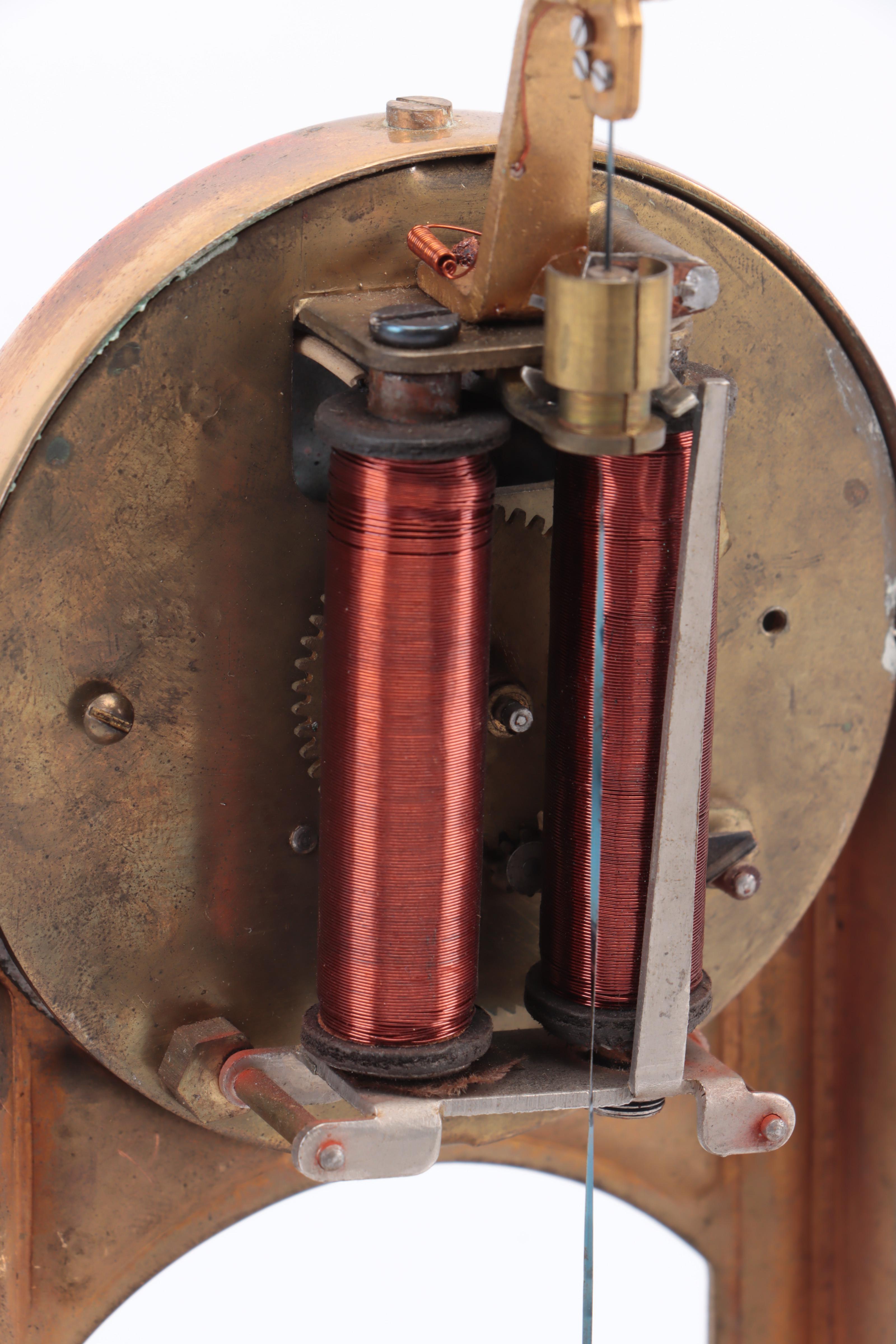 Tiffany Never-Wind Electric Torsion Anniversary Clock